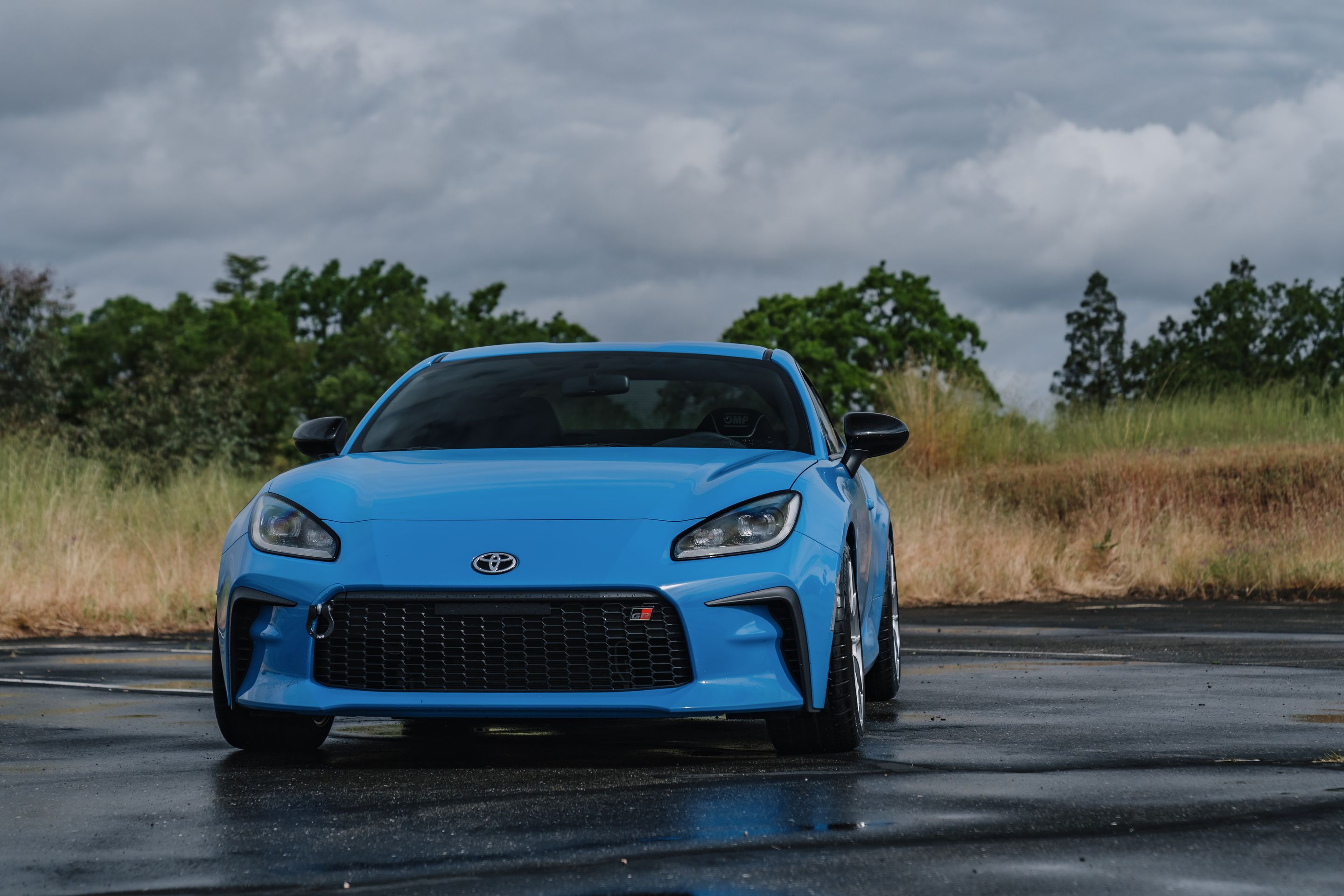Blue Toyota GR86 with 18" VS-5RS Apex wheels in Brushed Clear