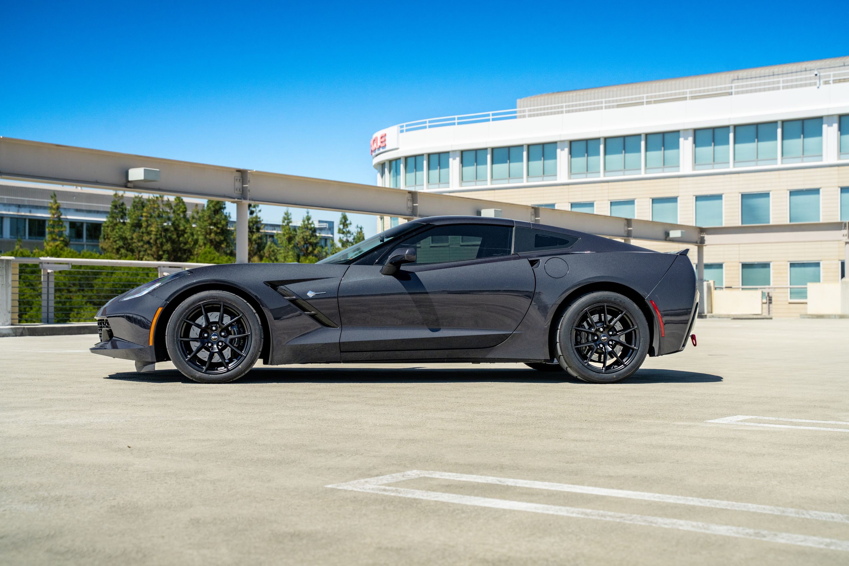 Grey Chevrolet C7 Corvette Stingray/Z51 with 18" VS-5 Apex wheels in Satin Black