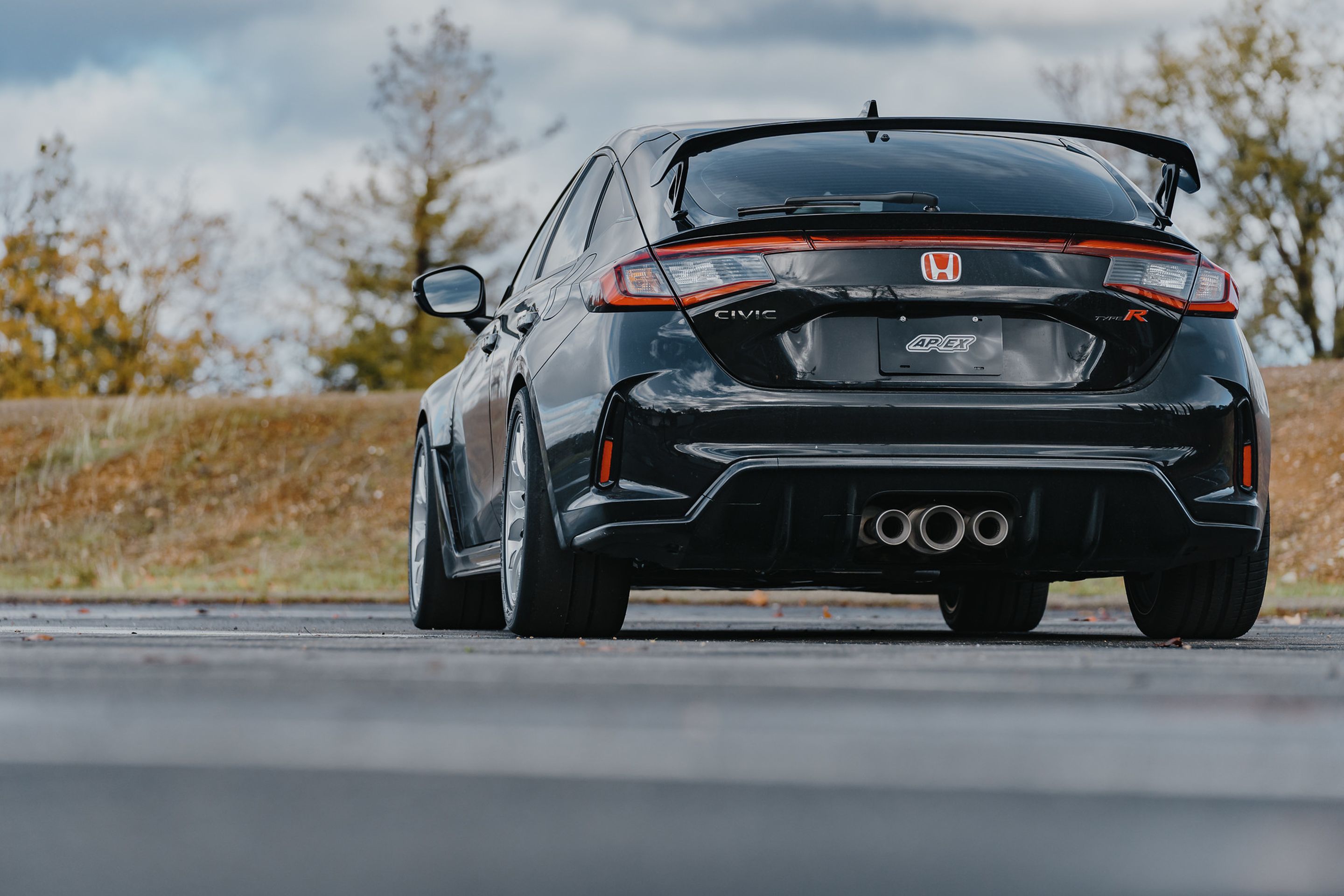 Black Honda FL5 Civic Type-R with 18" EC-7 Apex wheels in Race Silver