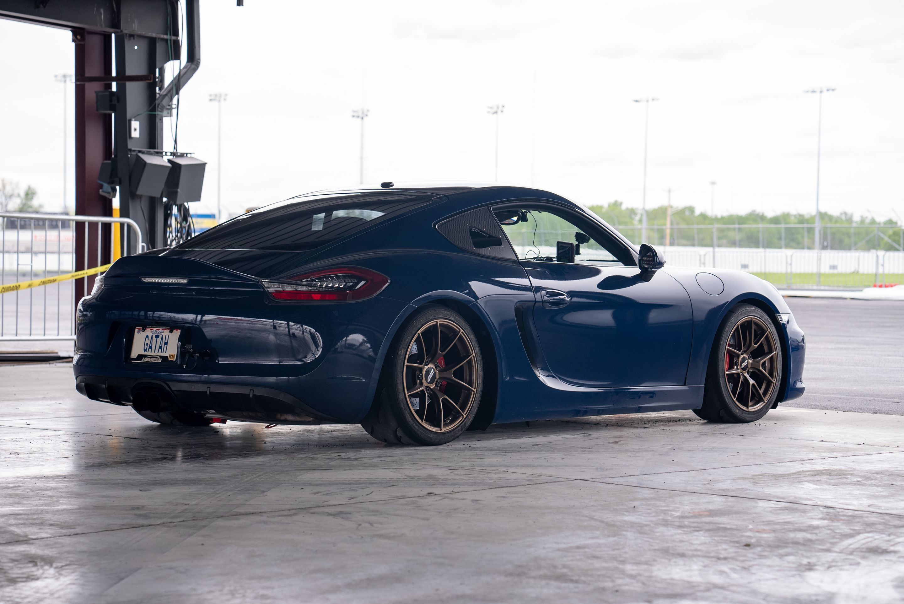 Blue Porsche 981 Cayman GTS with 18" VS-5RS Apex wheels in Satin Bronze