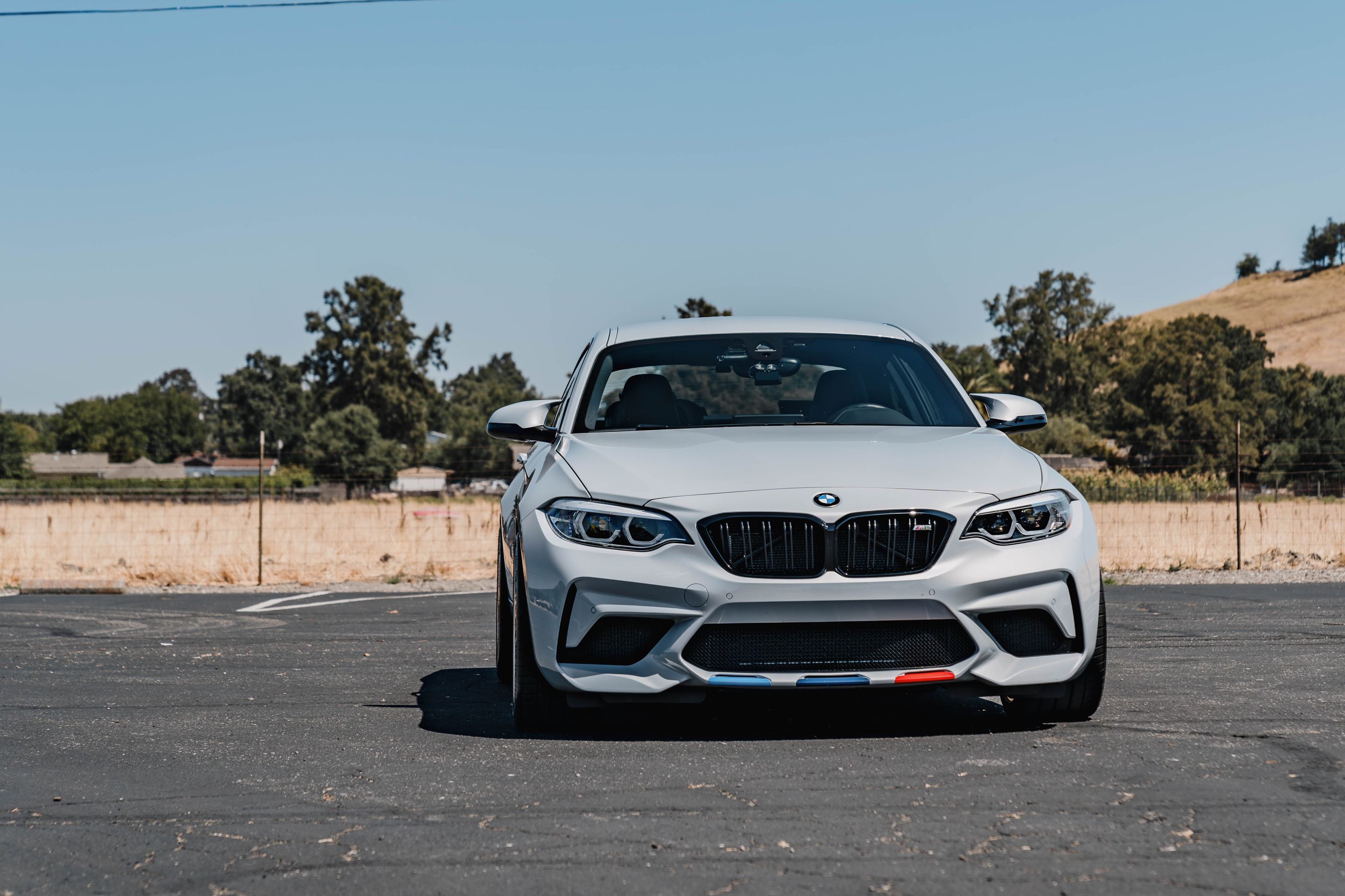 Silver BMW F87 M2 with 19" ARC-8RT Apex wheels in Brushed Clear