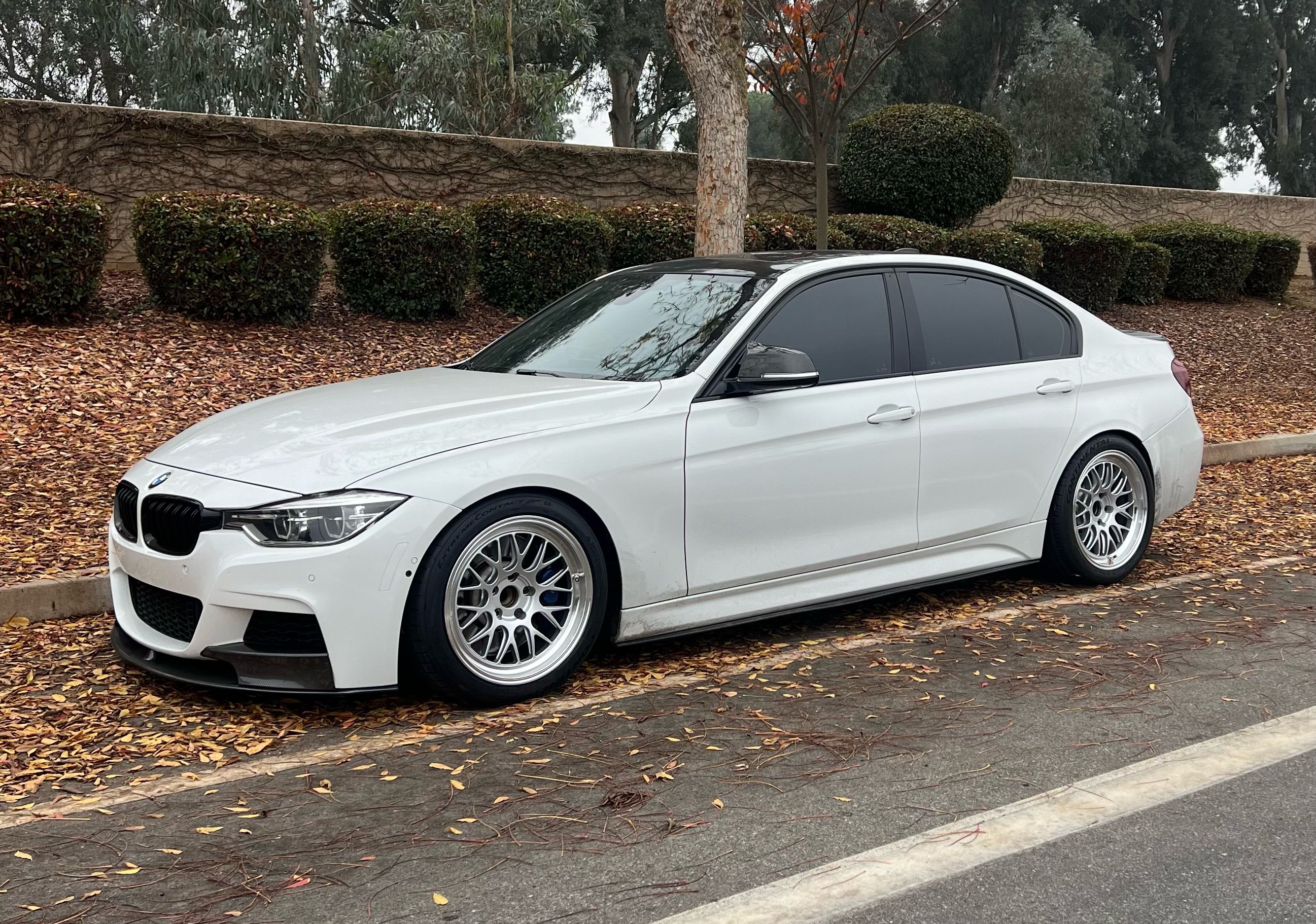 White BMW F30 Sedan 3 Series with 18" ML-10RT Apex wheels in Machined Lip Race Silver