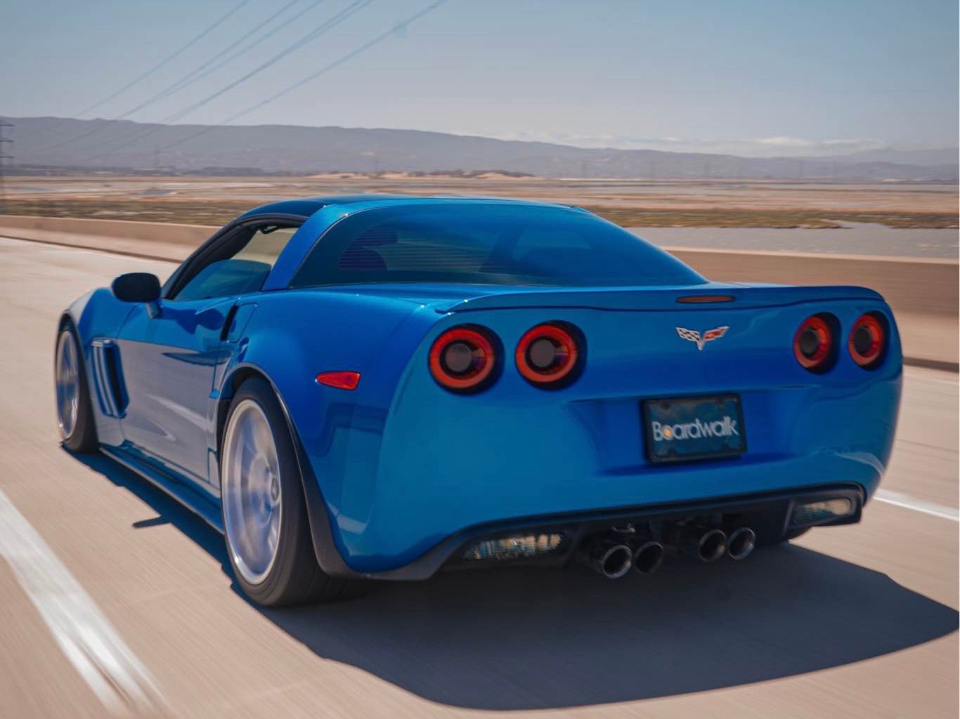 Blue Chevrolet C6 Corvette Grand Sport with 18"/19" VS-5RS Apex wheels in Brushed Clear