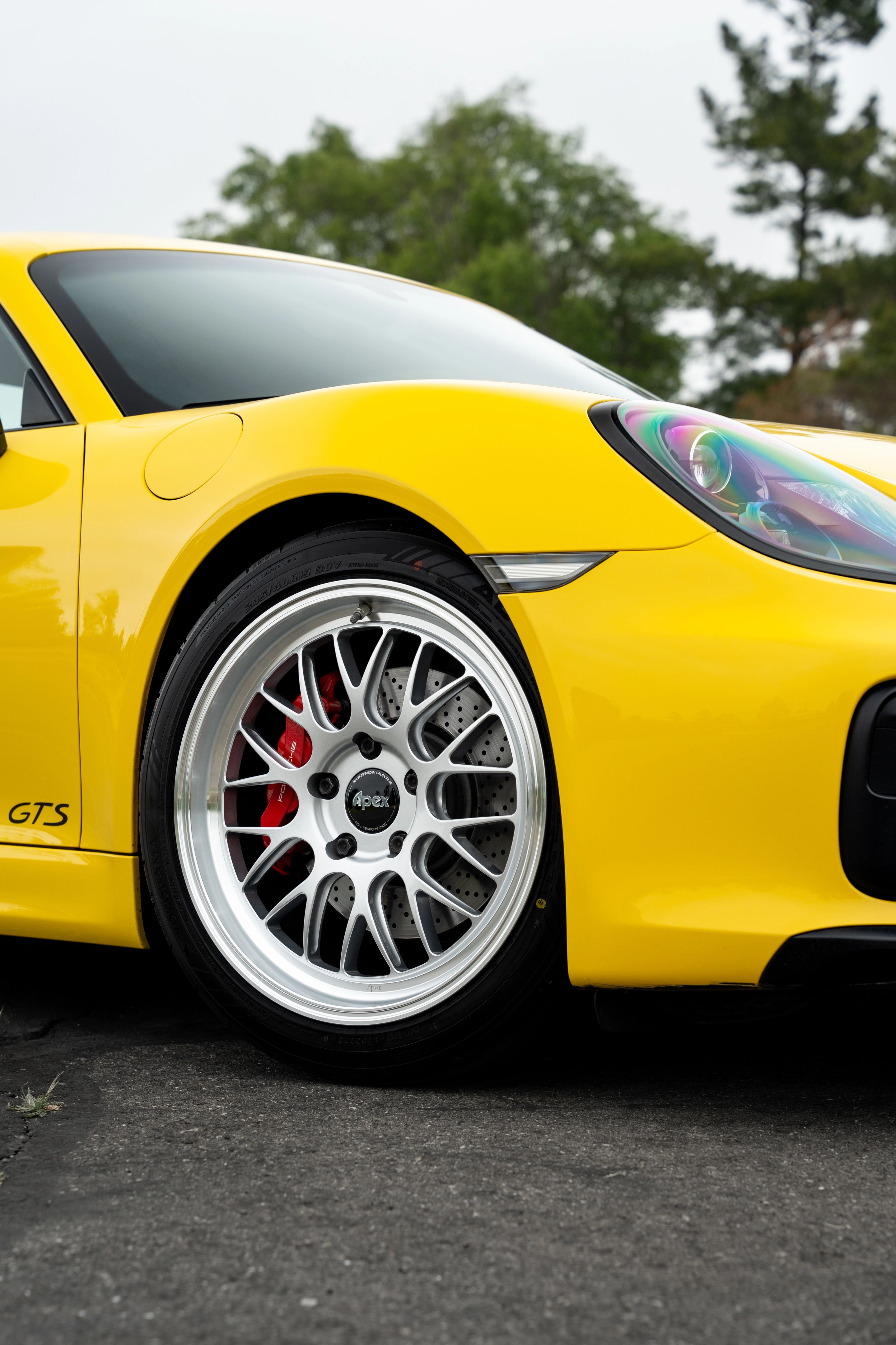 Yellow Porsche 981 Cayman GTS with 19" ML-10RT Apex wheels in Machined Lip Race Silver