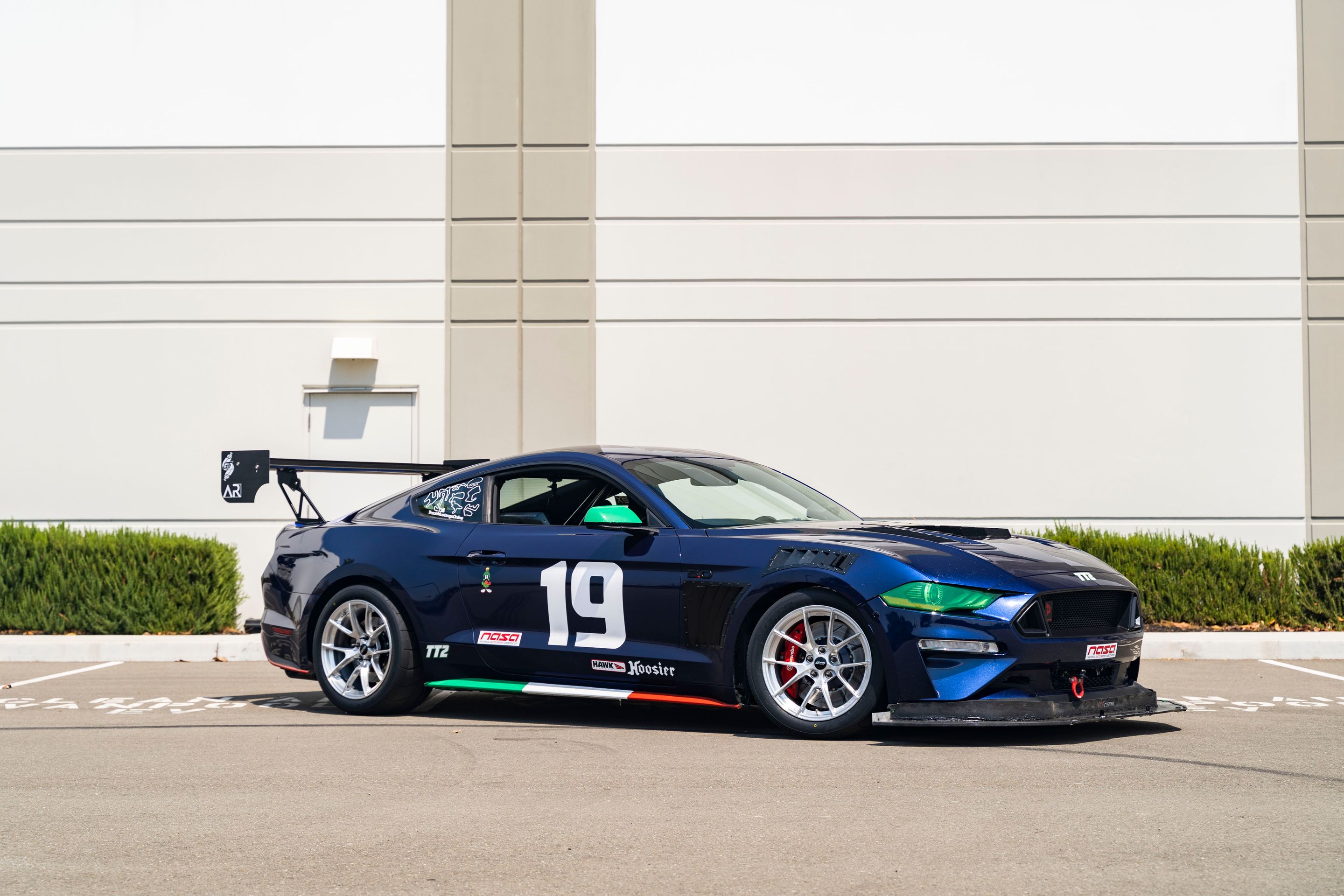 Blue Ford S550 Mustang GT with 18" VS-5RS Apex wheels in Brushed Clear