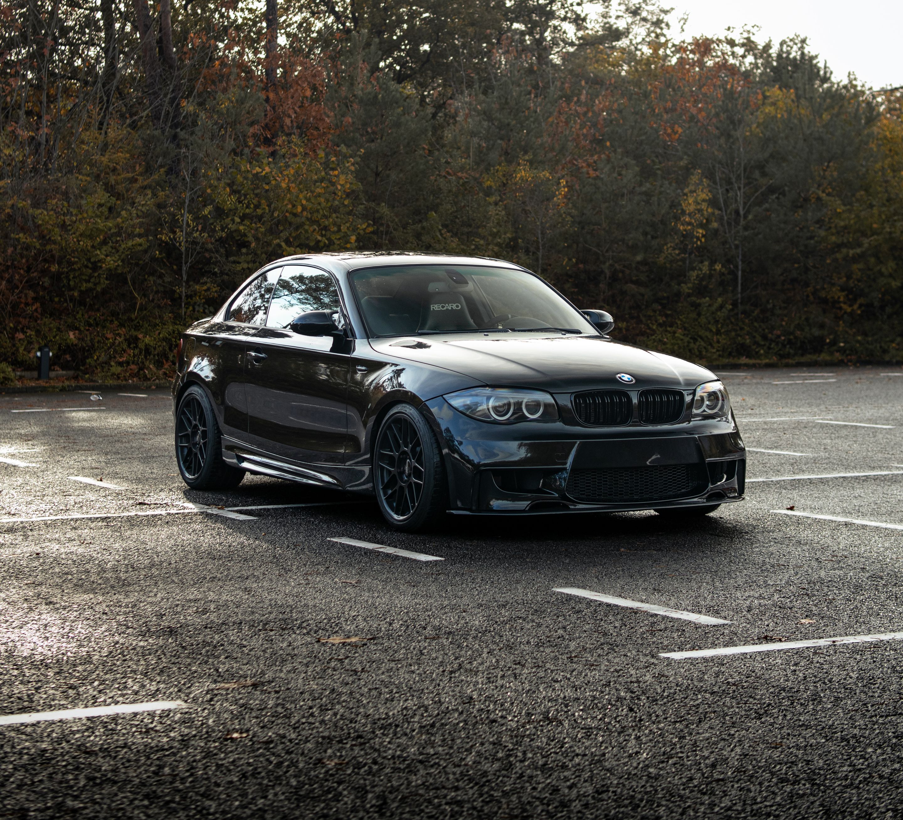 Black BMW E82 Coupe 1 Series with 18" ARC-8 Apex wheels in Satin Black