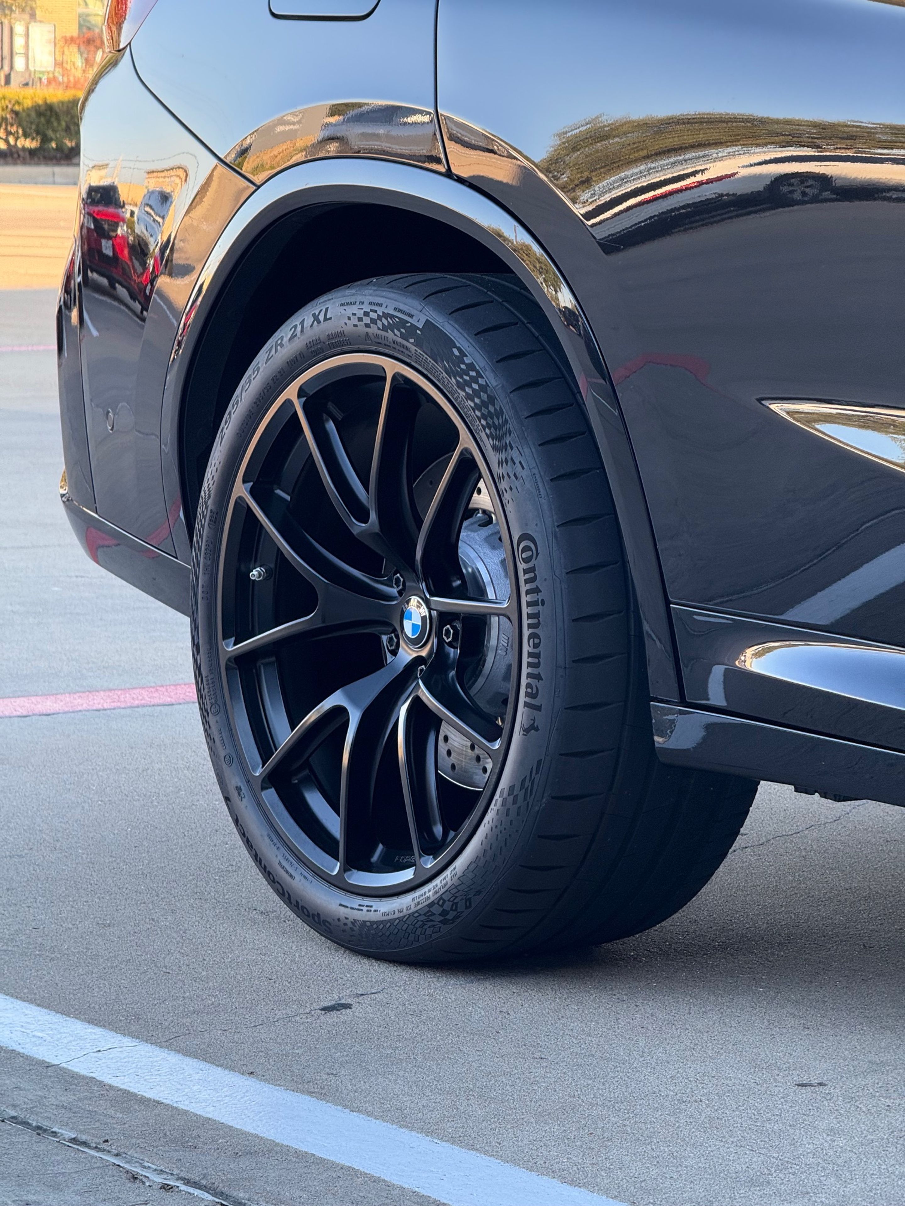 Black BMW F98 X4M with 21" VS-5RX Apex wheels in Satin Black