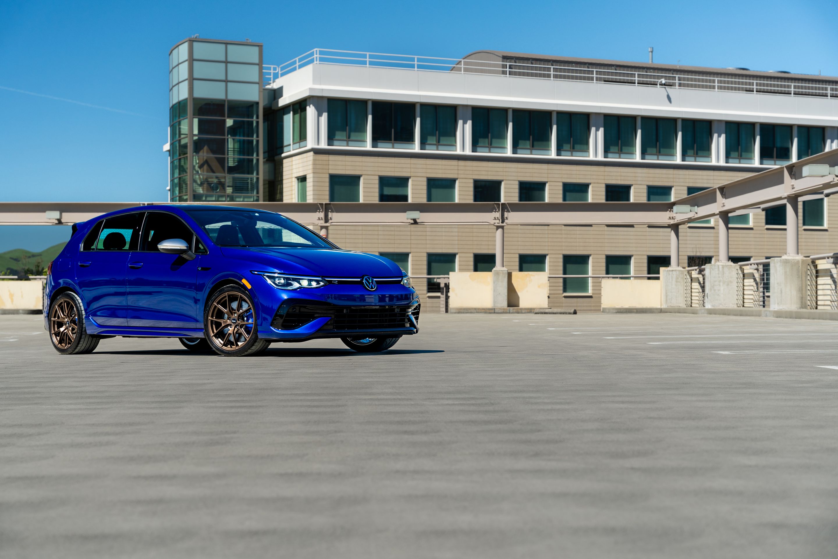 Blue VW MK8 Golf R with 18" VS-5 Apex wheels in Satin Bronze