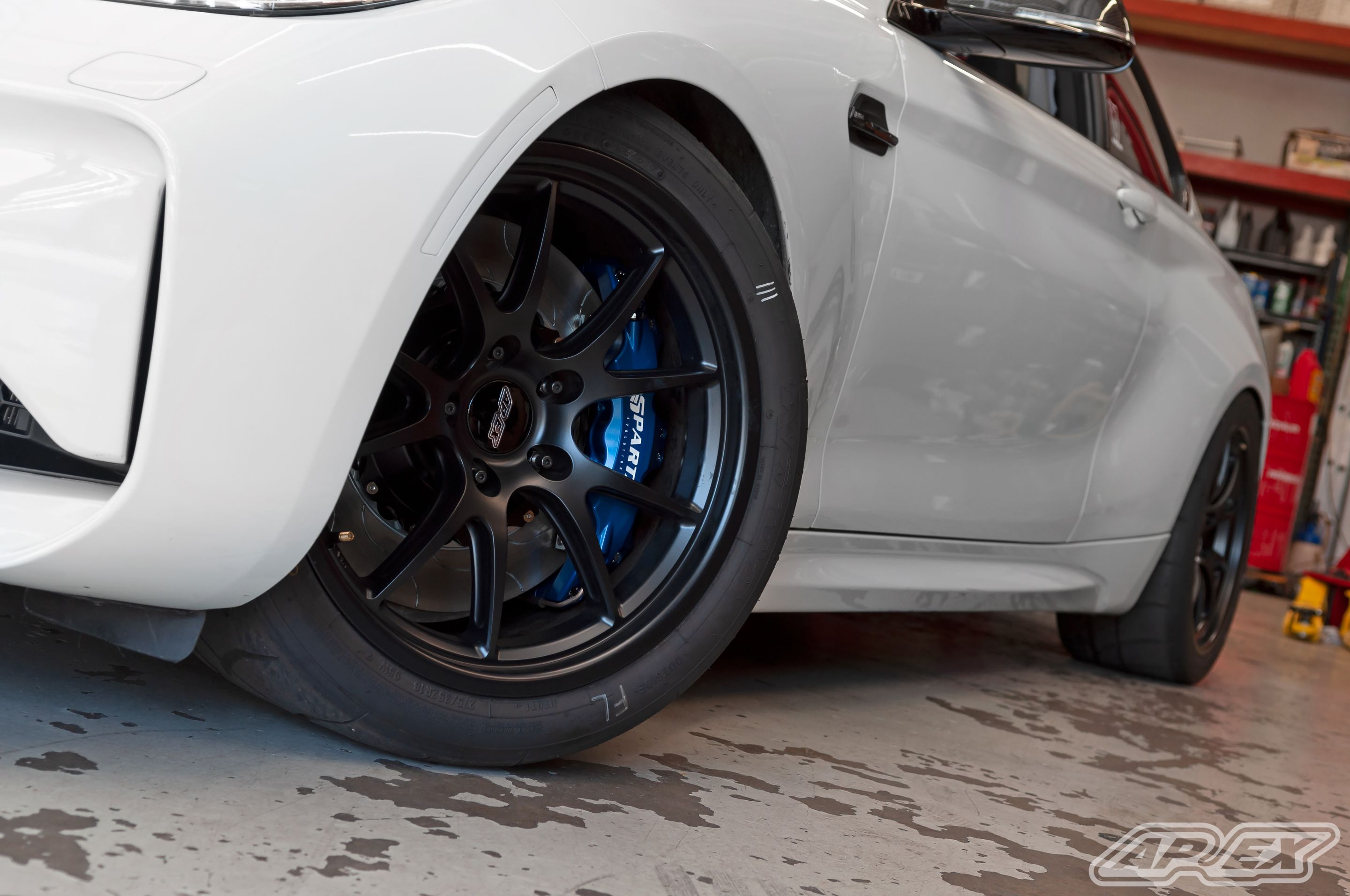 White BMW F87 M2 with 18" FL-5 Apex wheels in Satin Black