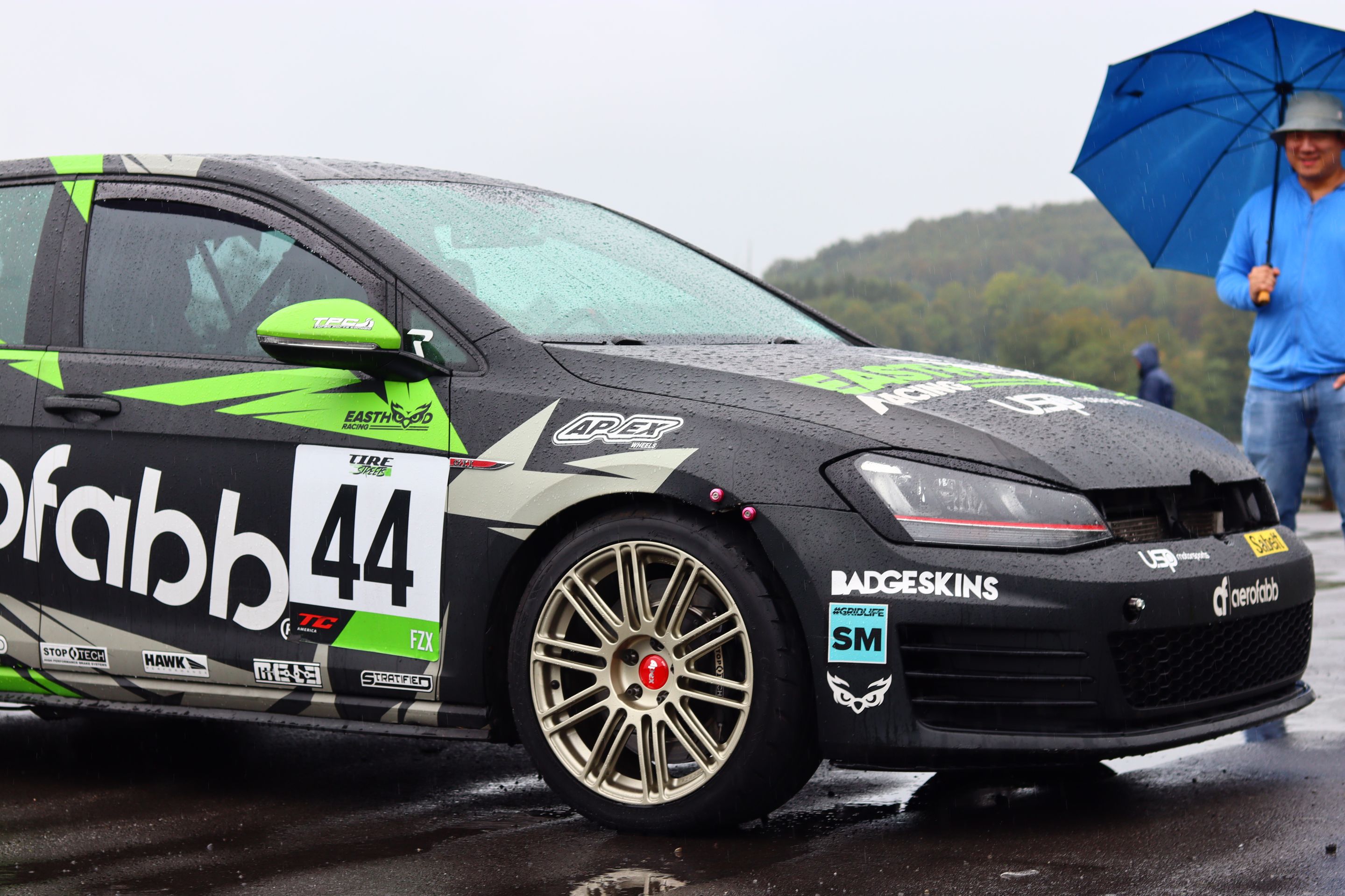 Race Livery VW MK7 GTI with 18" TC-10RT Apex wheels in Motorsport Gold