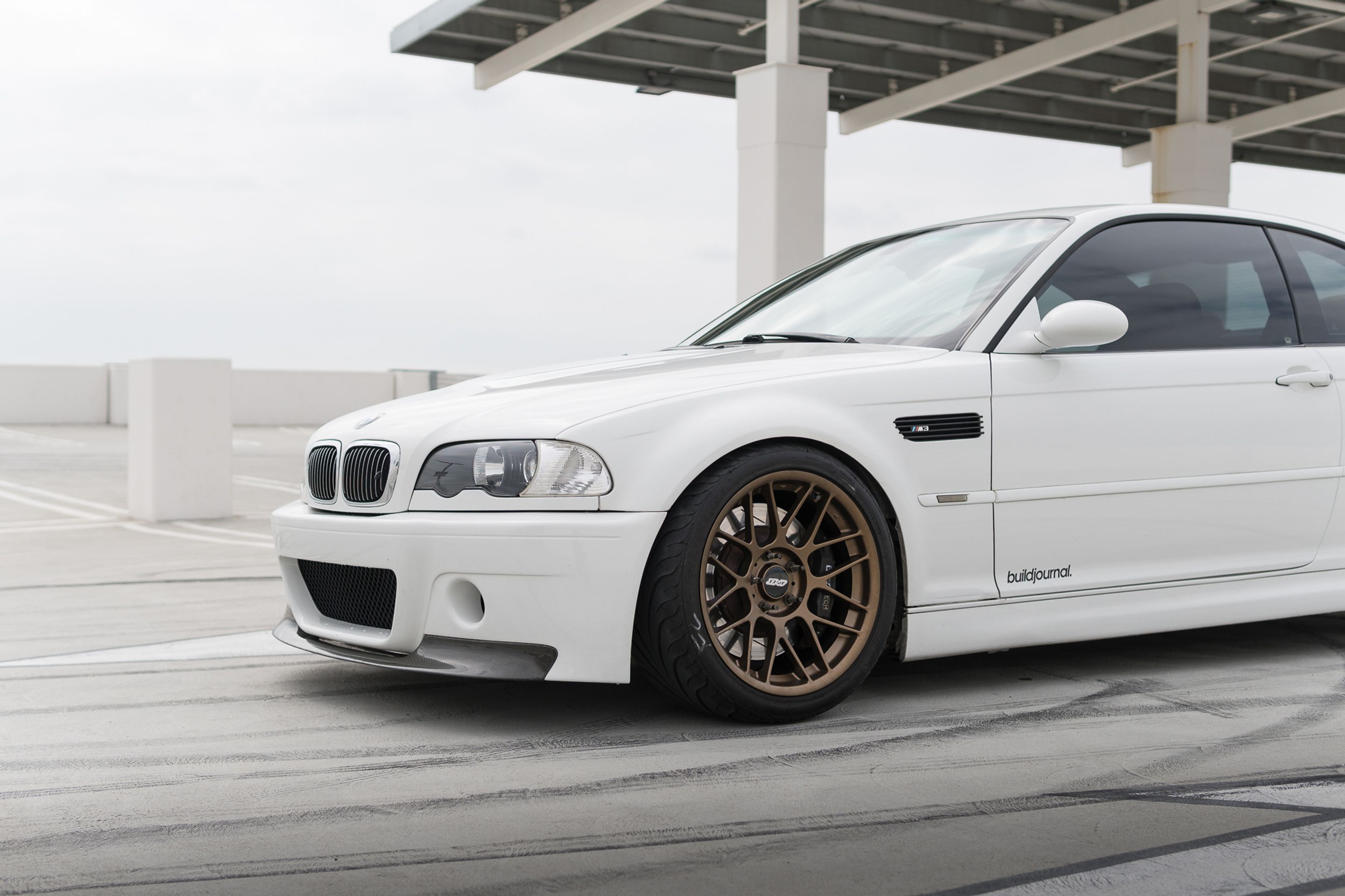 White BMW E46 M3 with 18" ARC-8 Apex wheels in Satin Bronze