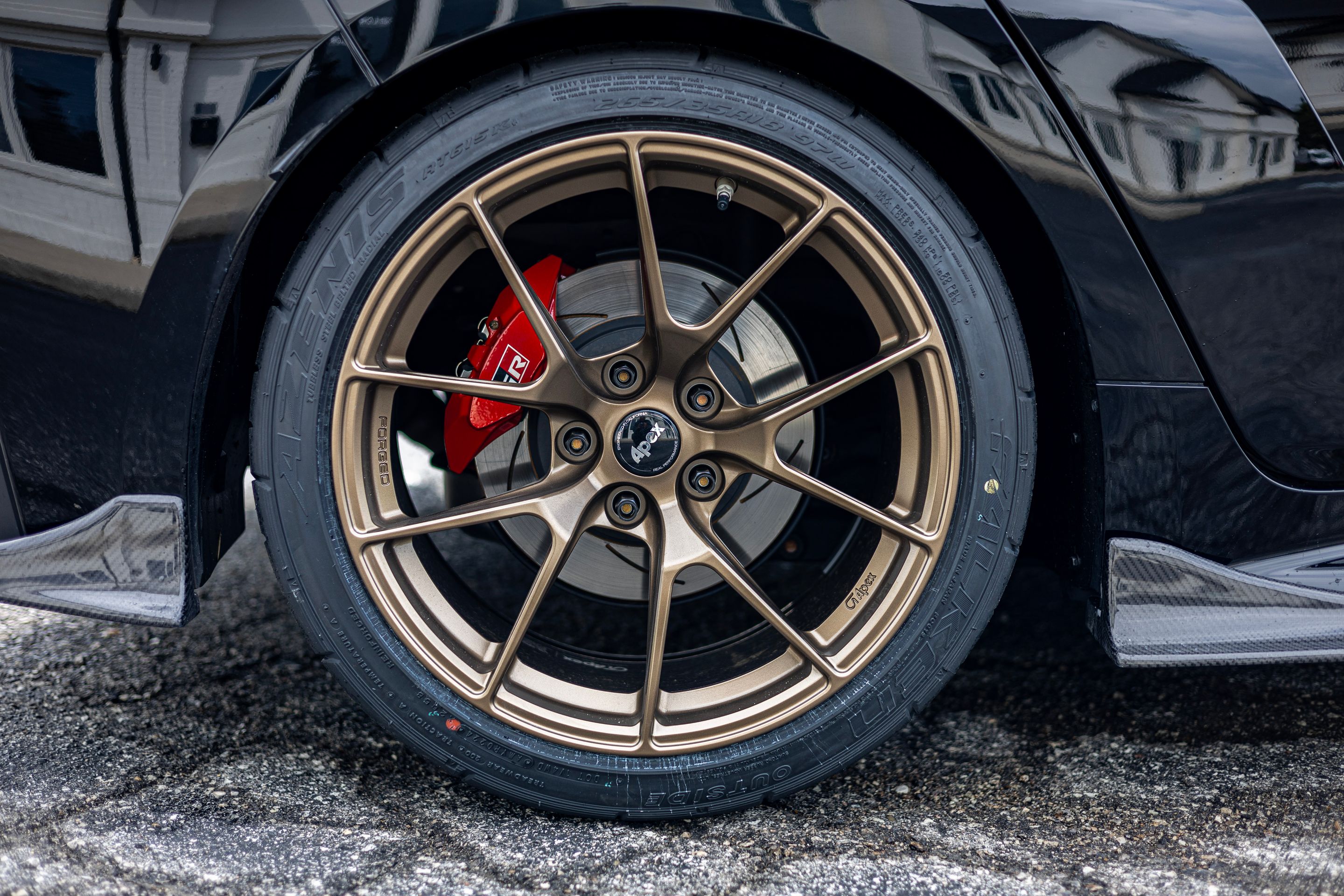 Black Toyota GR Corolla with 18" VS-5RS Apex wheels in Satin Bronze