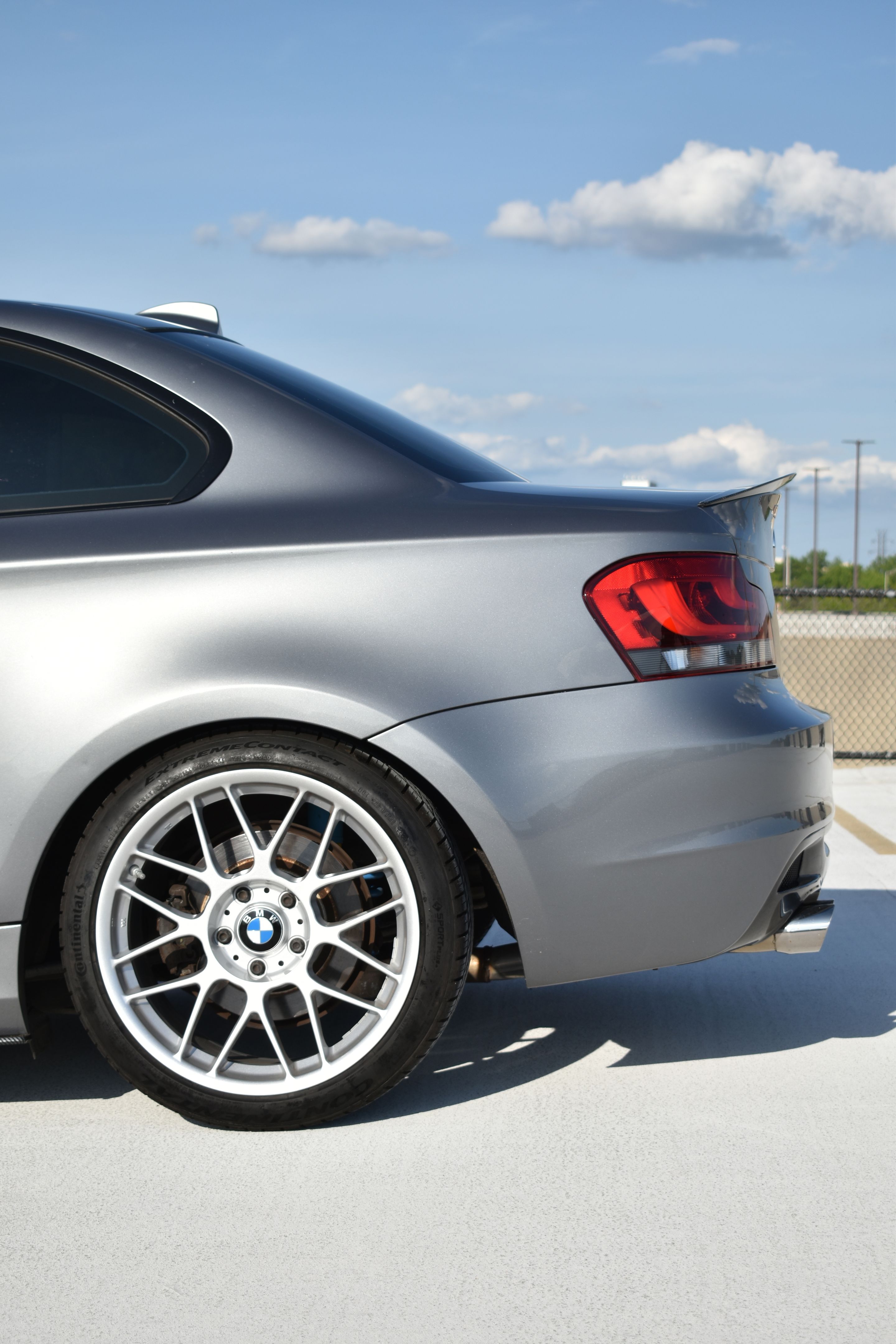 Silver BMW E82 Coupe 1 Series with 18" ARC-8 Apex wheels in Race Silver