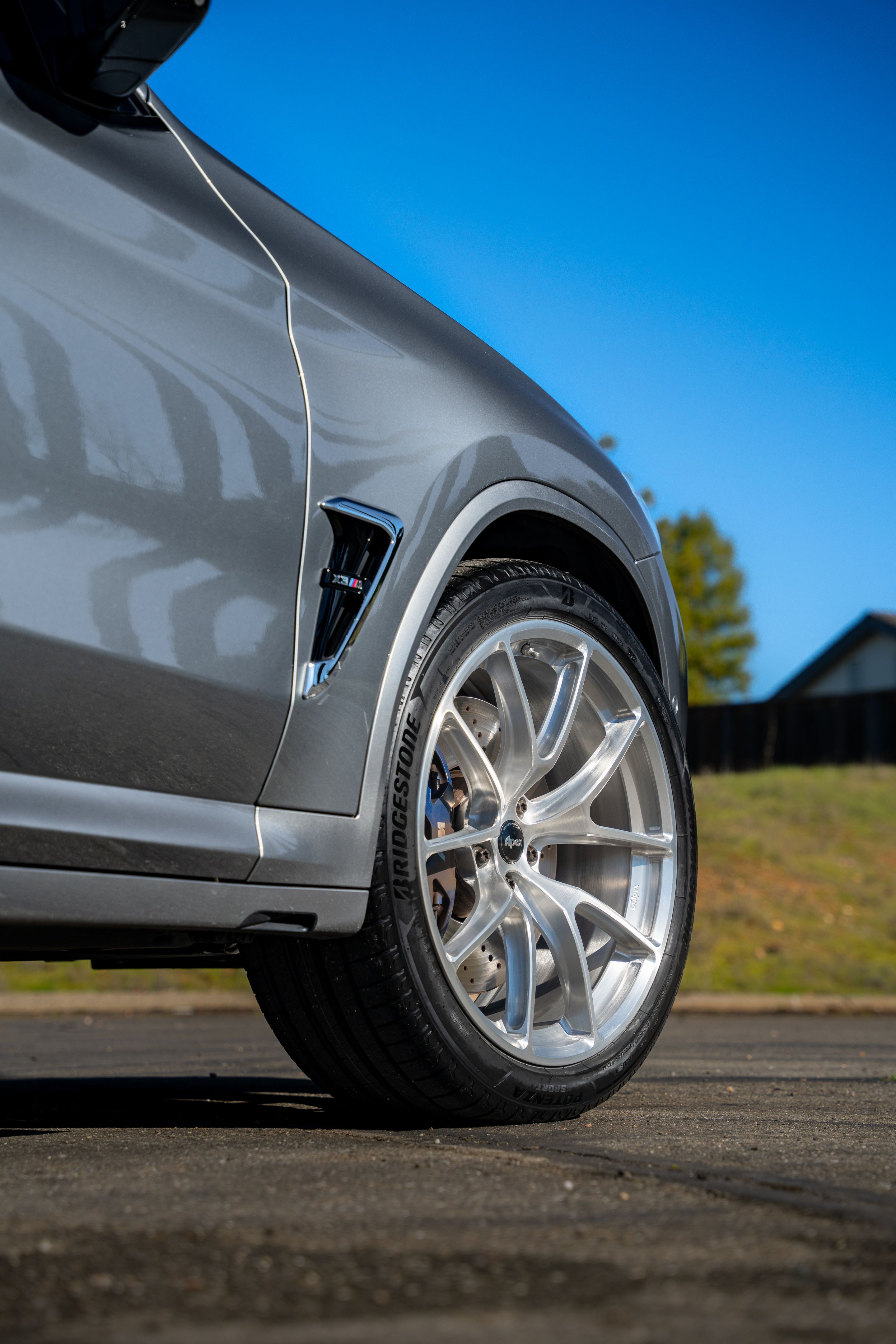 Silver BMW F97 X3M with 21" VS-5RX Apex wheels in Brushed Clear