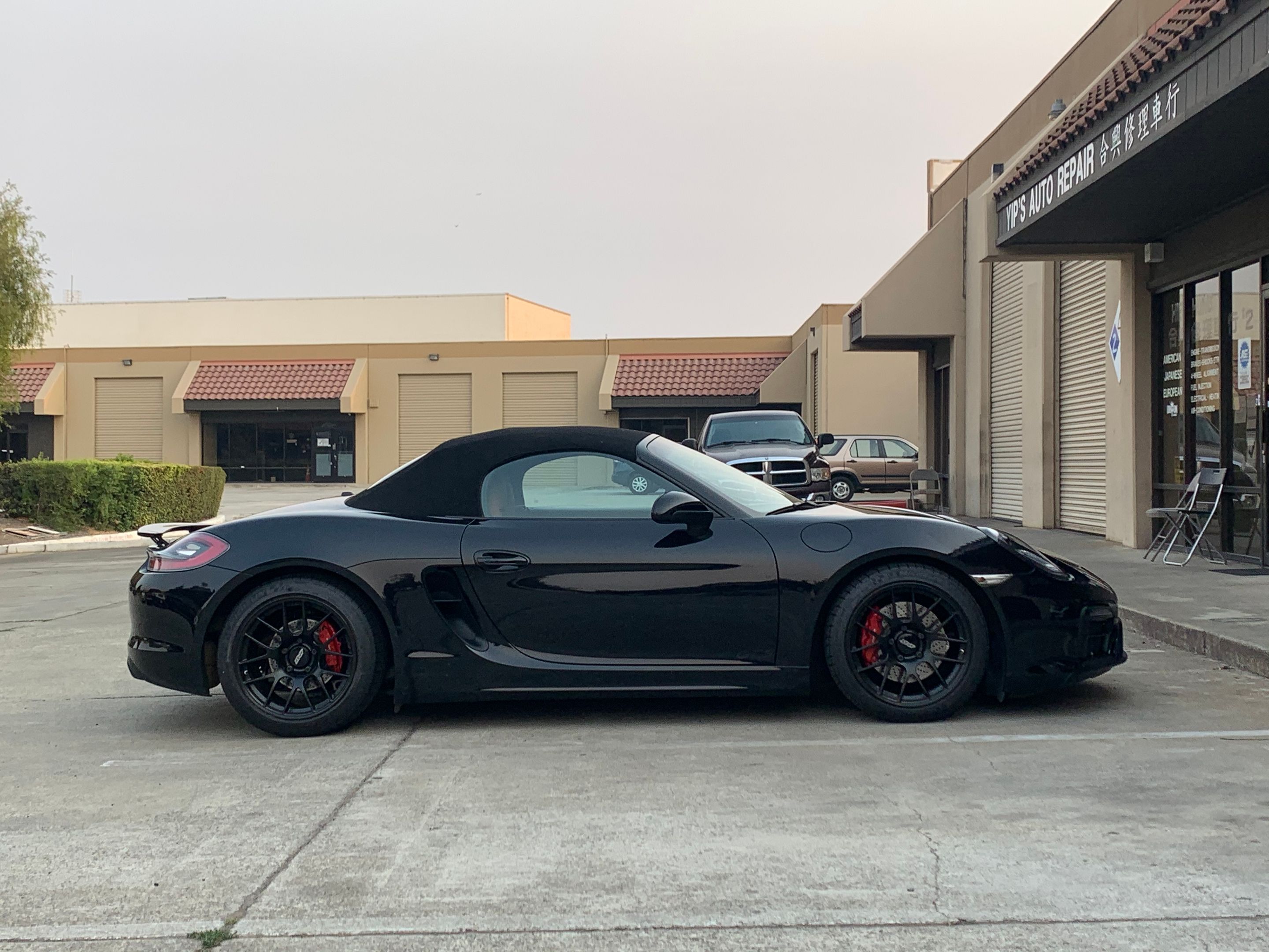 Black Porsche 981 Boxster GTS with 18" EC-7R Apex wheels in Satin Black