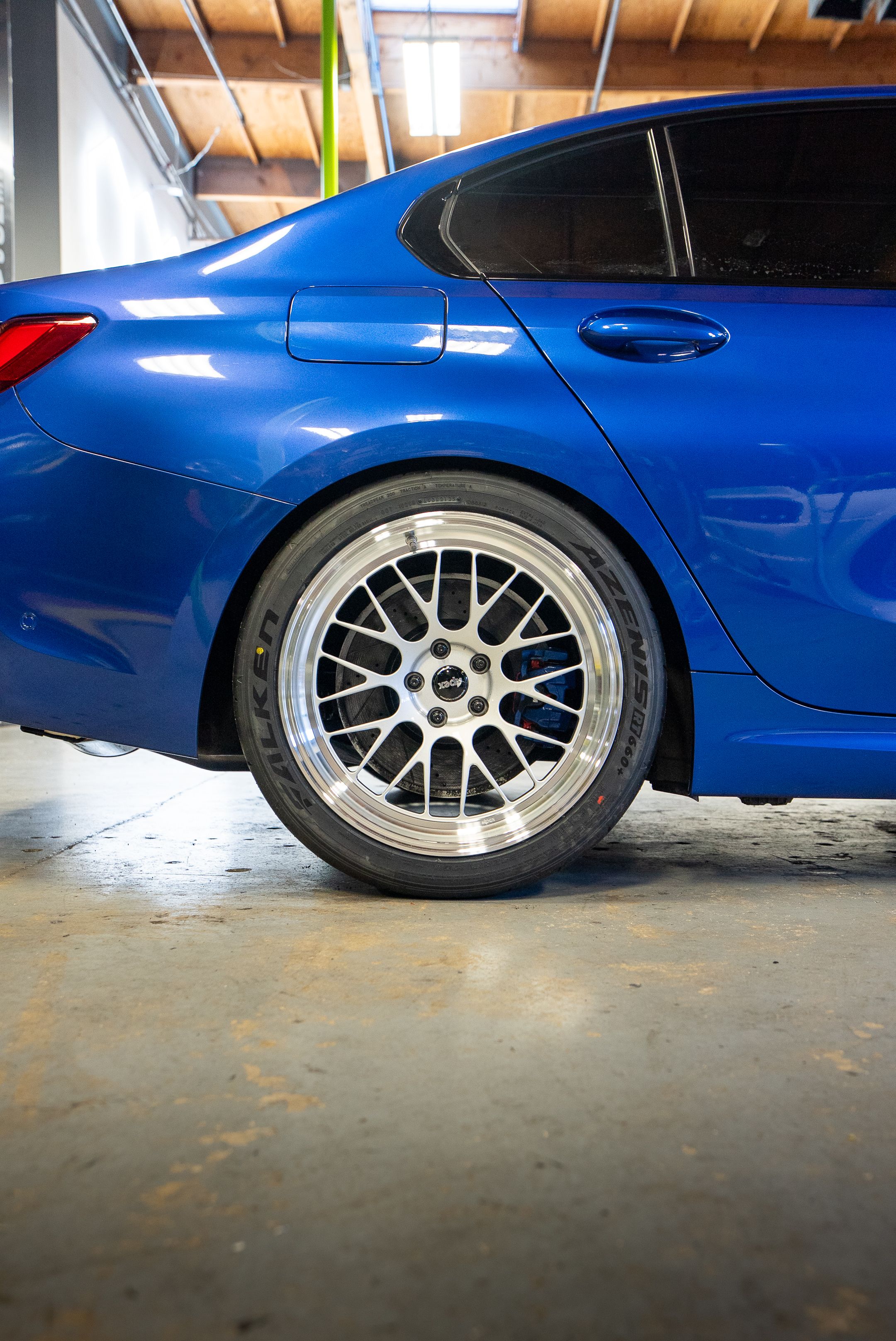 Blue BMW G20 Sedan 3 Series with 19" ML-10RT Apex wheels in Machined Lip Race Silver