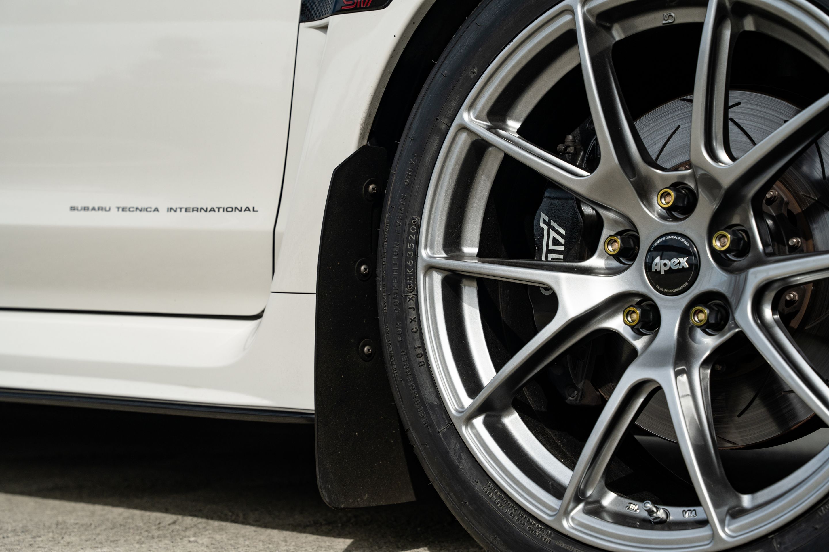 White Subaru VA WRX STI with 18" VS-5 Apex wheels in Hyper Black