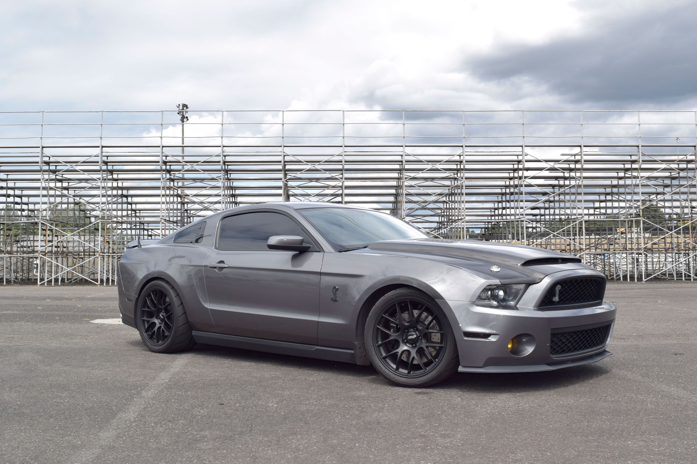 Grey Ford S197 Mustang GT500 with 19" EC-7 Apex wheels in Satin Black