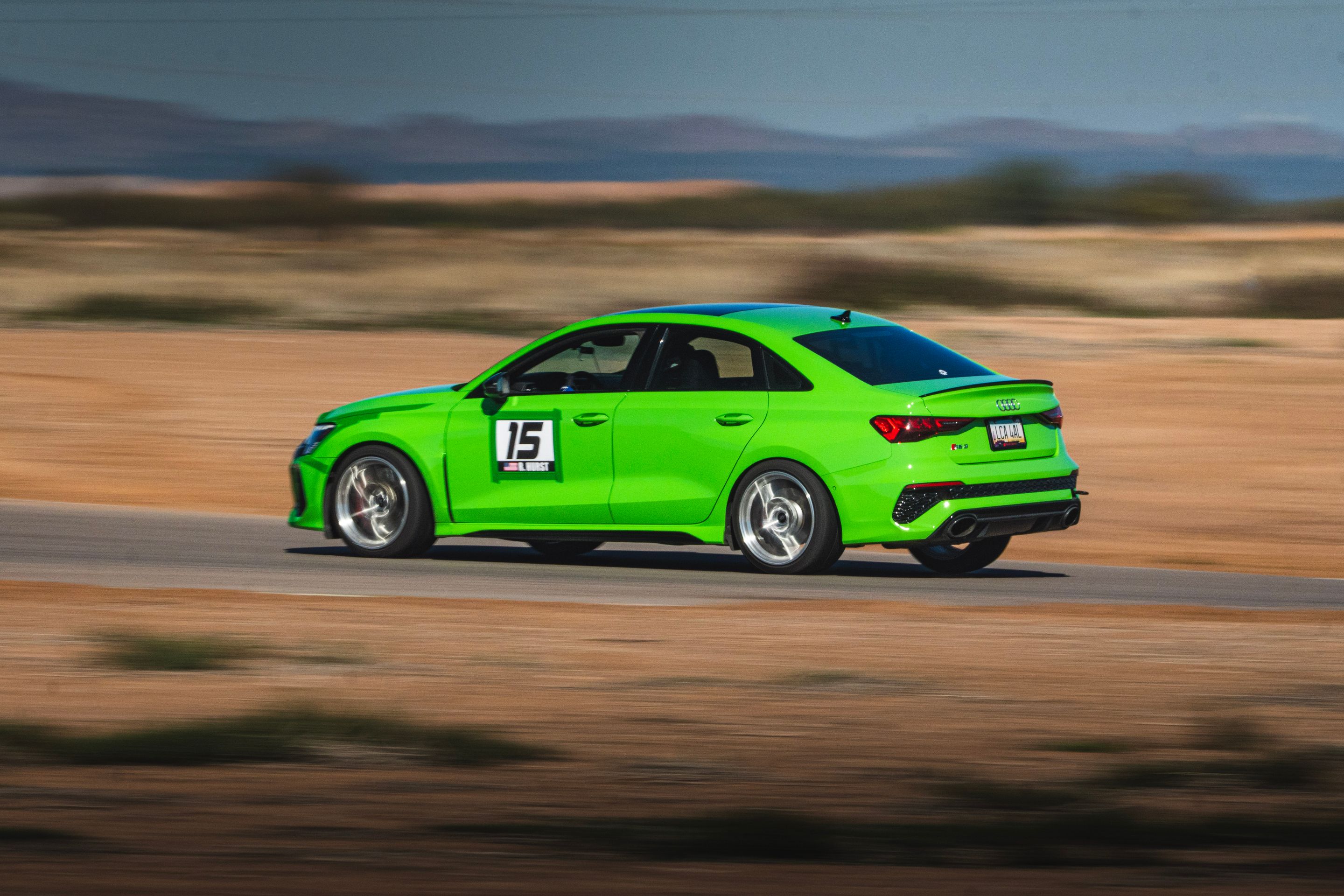 Green Audi 8Y RS 3 with 18" VS-5RS Apex wheels in Brushed Clear