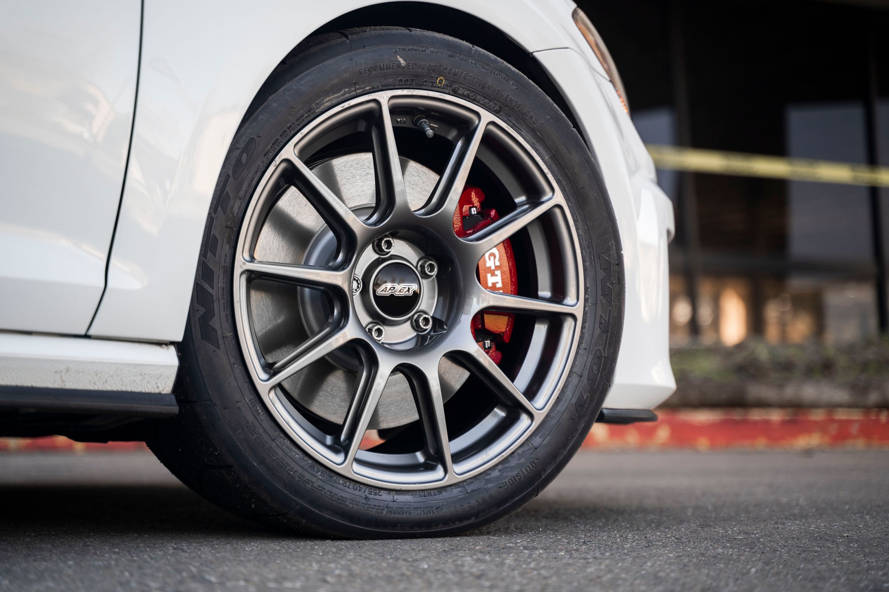 White VW MK7 GTI with 17" SM-10 Apex wheels in Anthracite