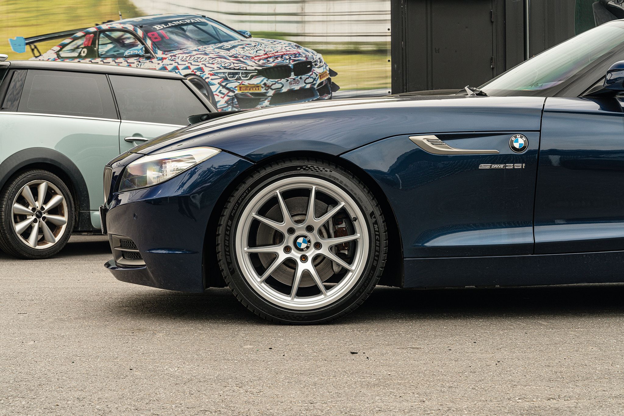 Blue BMW E89 Z4 with 18" FL-5 Apex wheels in Race Silver