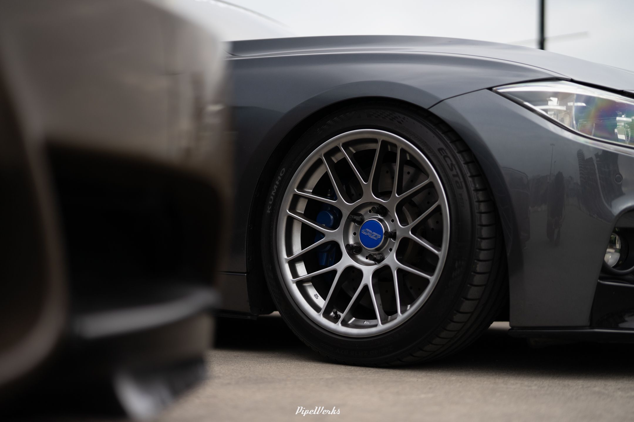 Grey BMW F30 Sedan 3 Series with 18" ARC-8 Apex wheels in Hyper Black