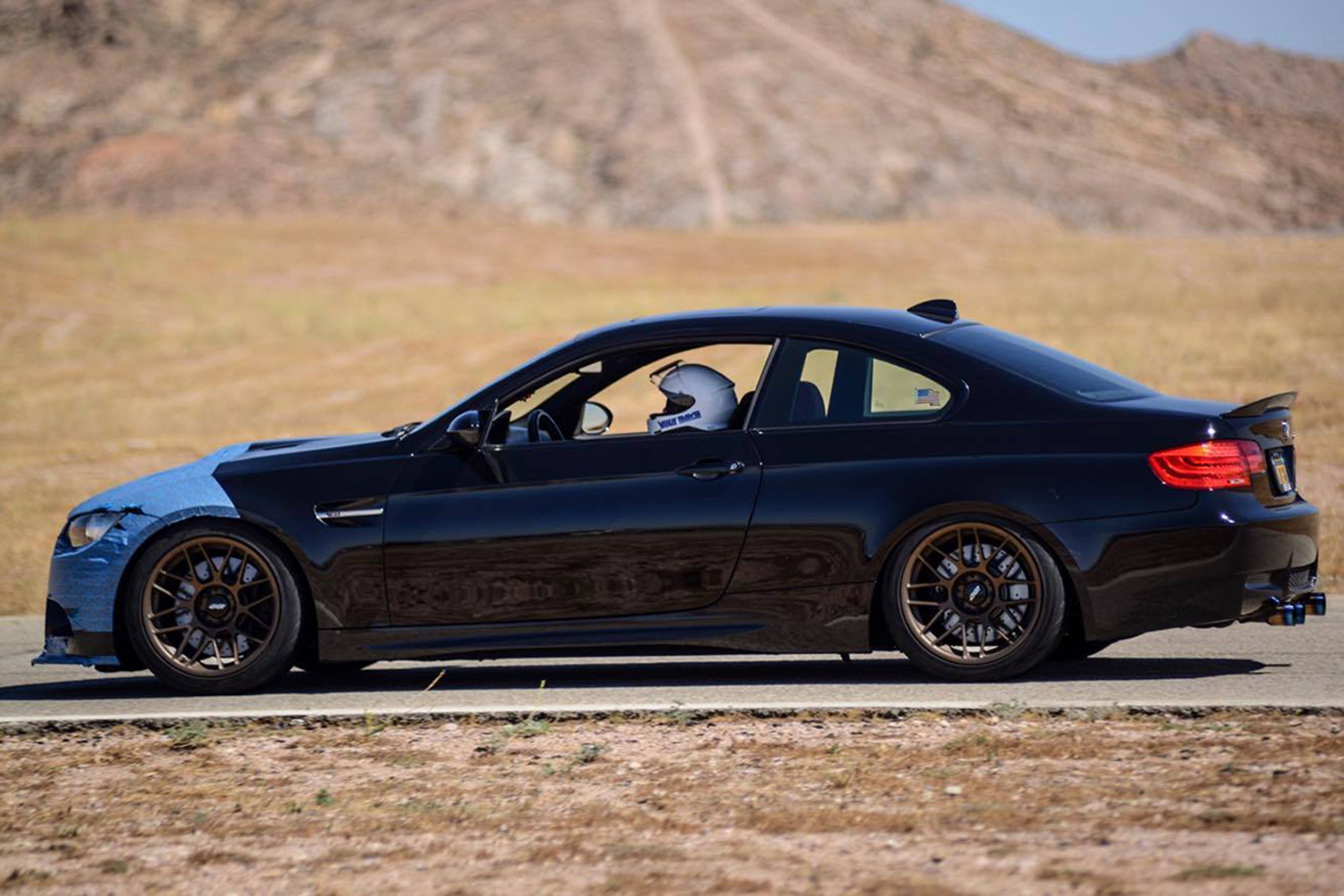 Black BMW E92 Coupe M3 with 18" ARC-8 Apex wheels in Satin Bronze