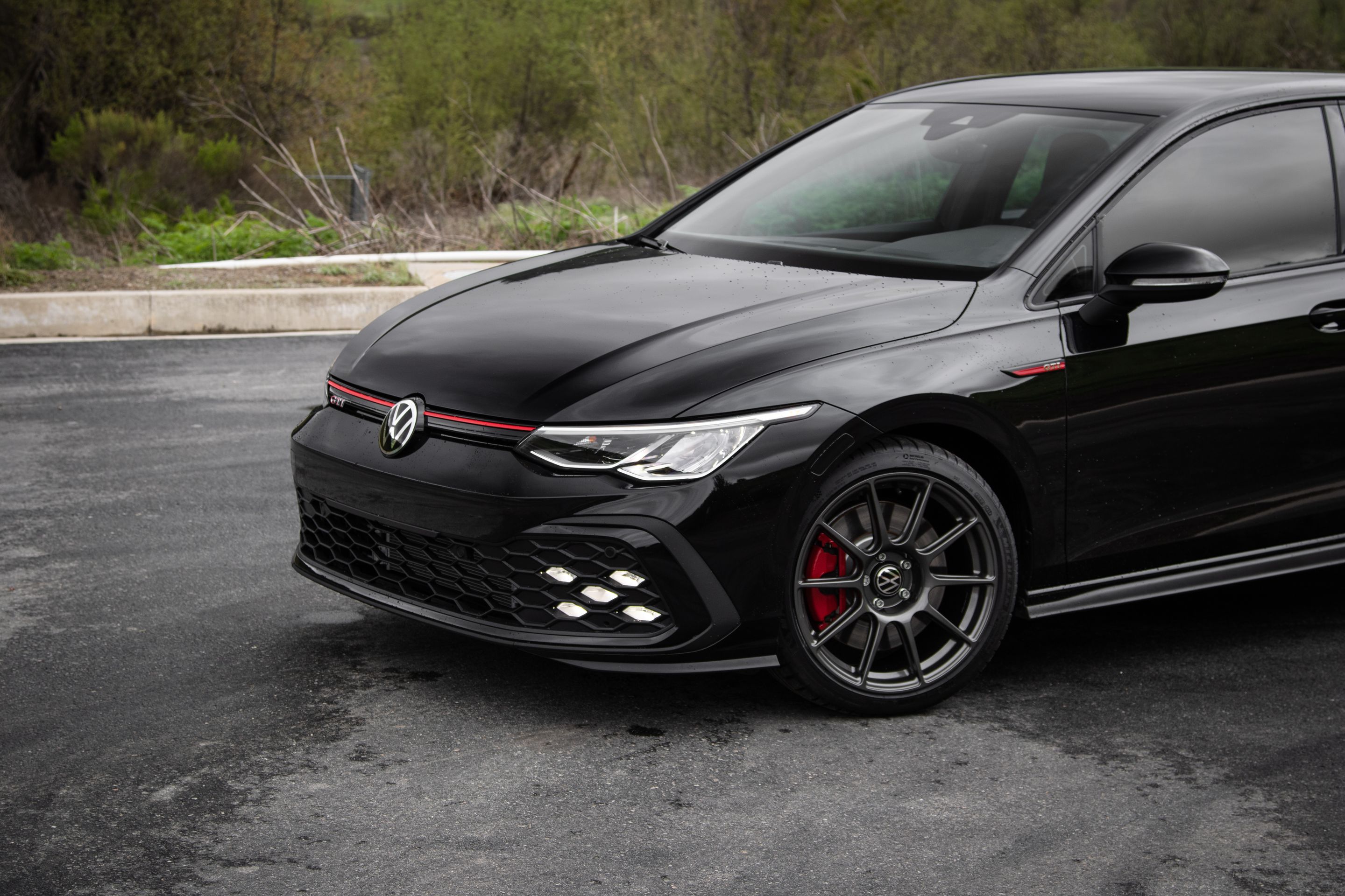 Black VW MK8 GTI with 18" SM-10 Apex wheels in Anthracite
