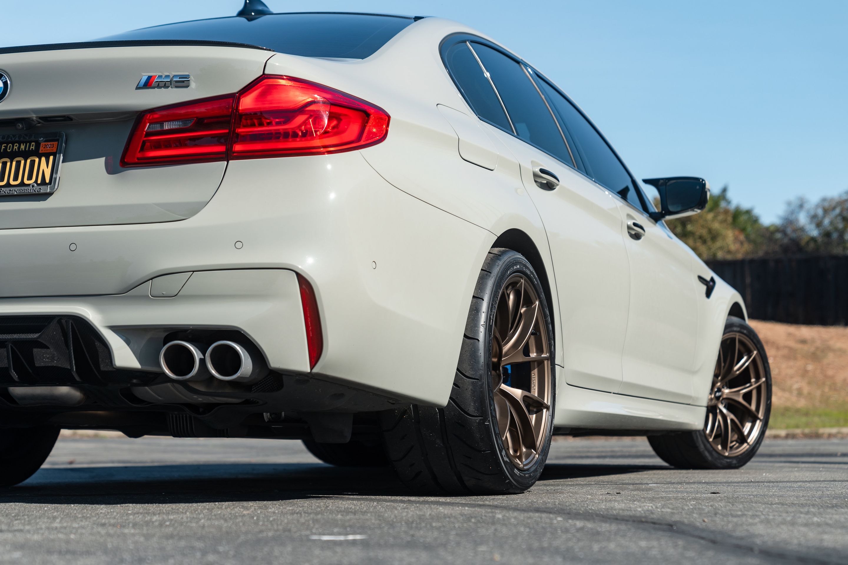 Grey BMW F90 M5 with 19" VS-5RS Apex wheels in Satin Bronze