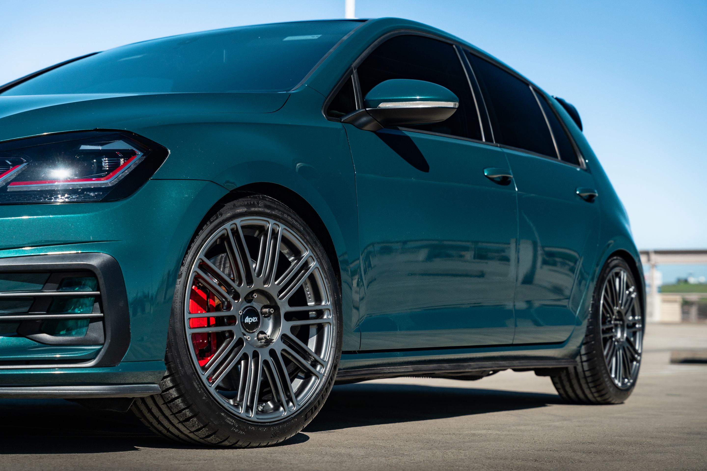 Green VW MK7 GTI with 18" TC-10RT Apex wheels in Anthracite