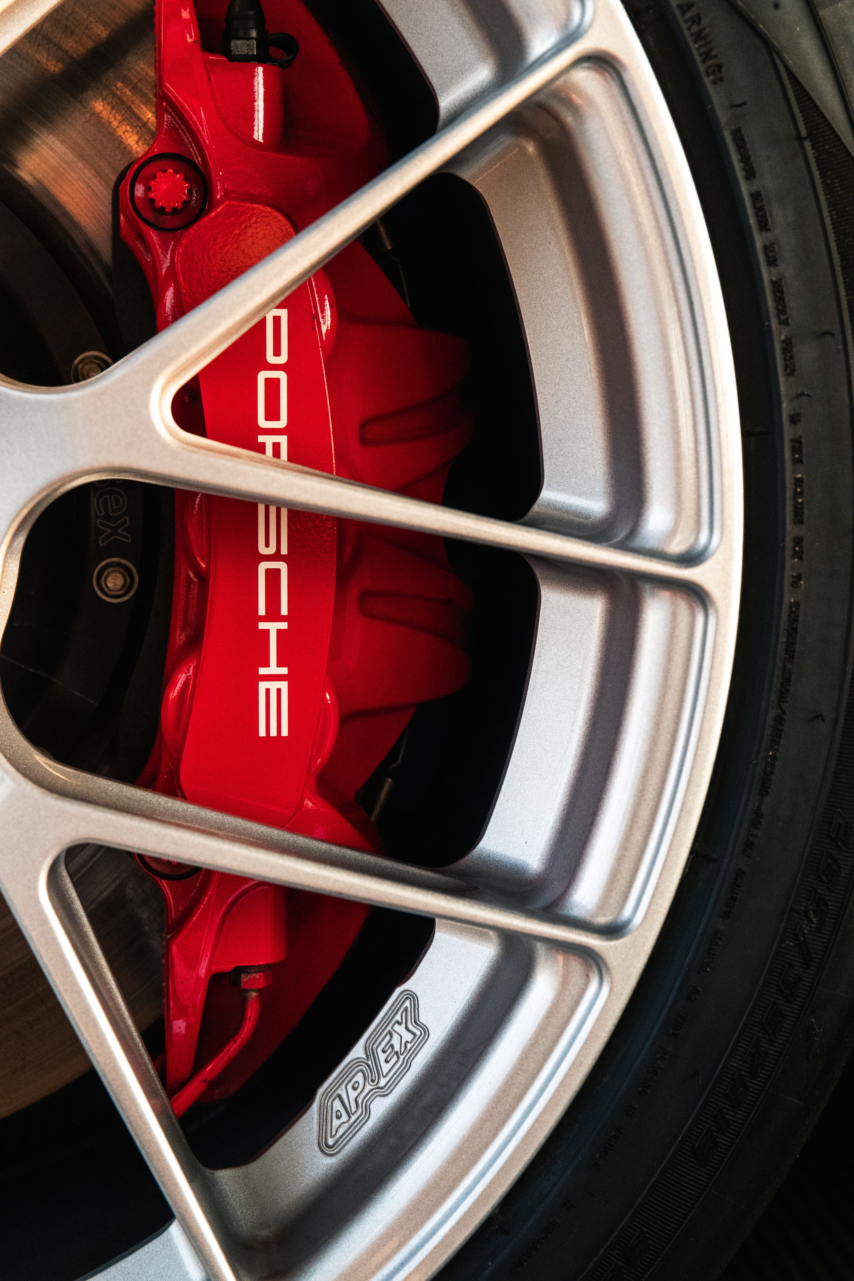 Blue Porsche 718 Cayman GT4 RS with 19" EC-7RS Apex wheels in Race Silver