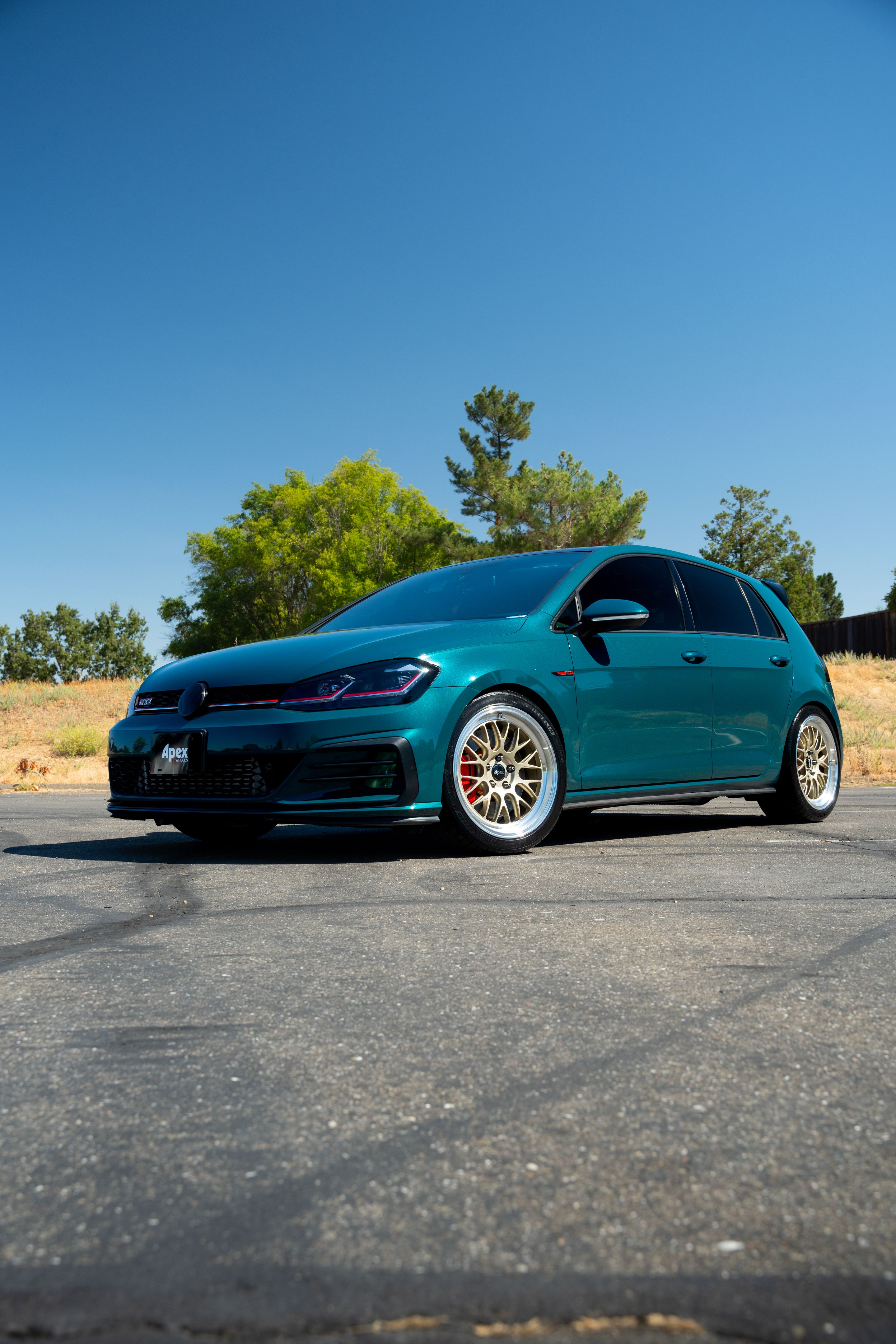 Green VW MK7 GTI with 18" ML-10RT Apex wheels in Machined Lip Gloss Motorsport Gold