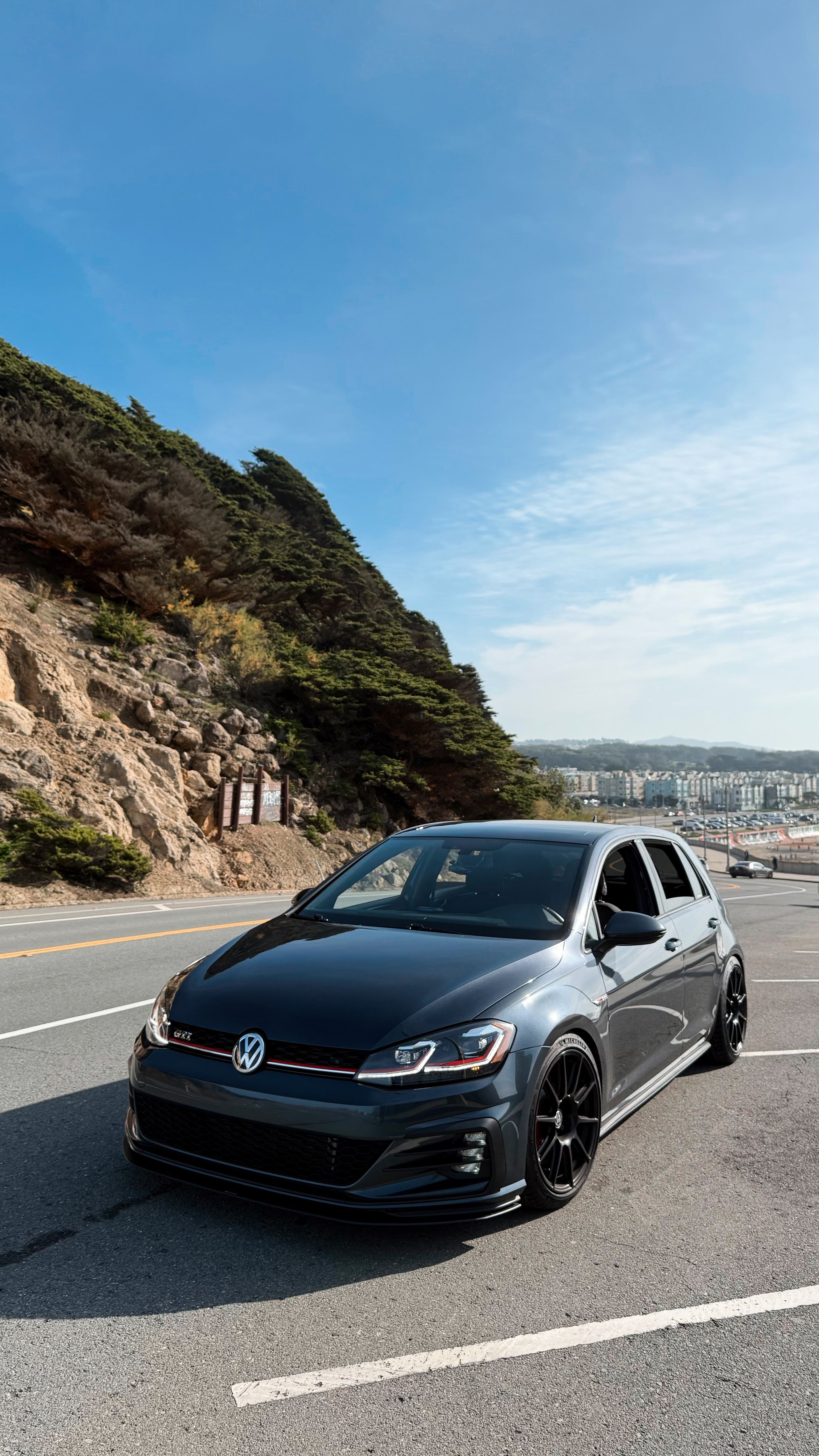 Grey VW MK7 GTI with 18" SM-10 Apex wheels in Satin Black