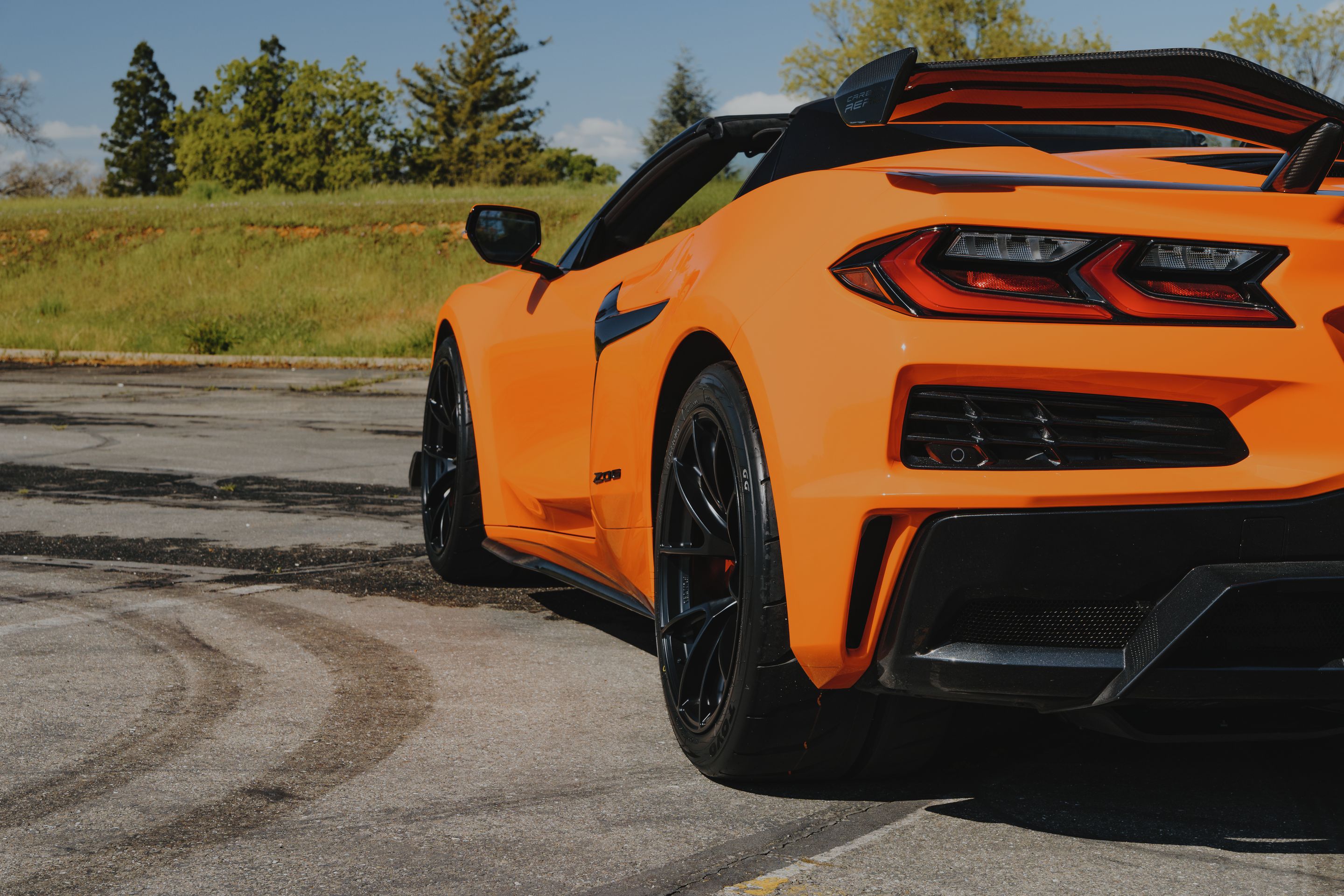 Orange Chevrolet C8 Corvette Z06 with 19" VS-5RS Apex wheels in Satin Black