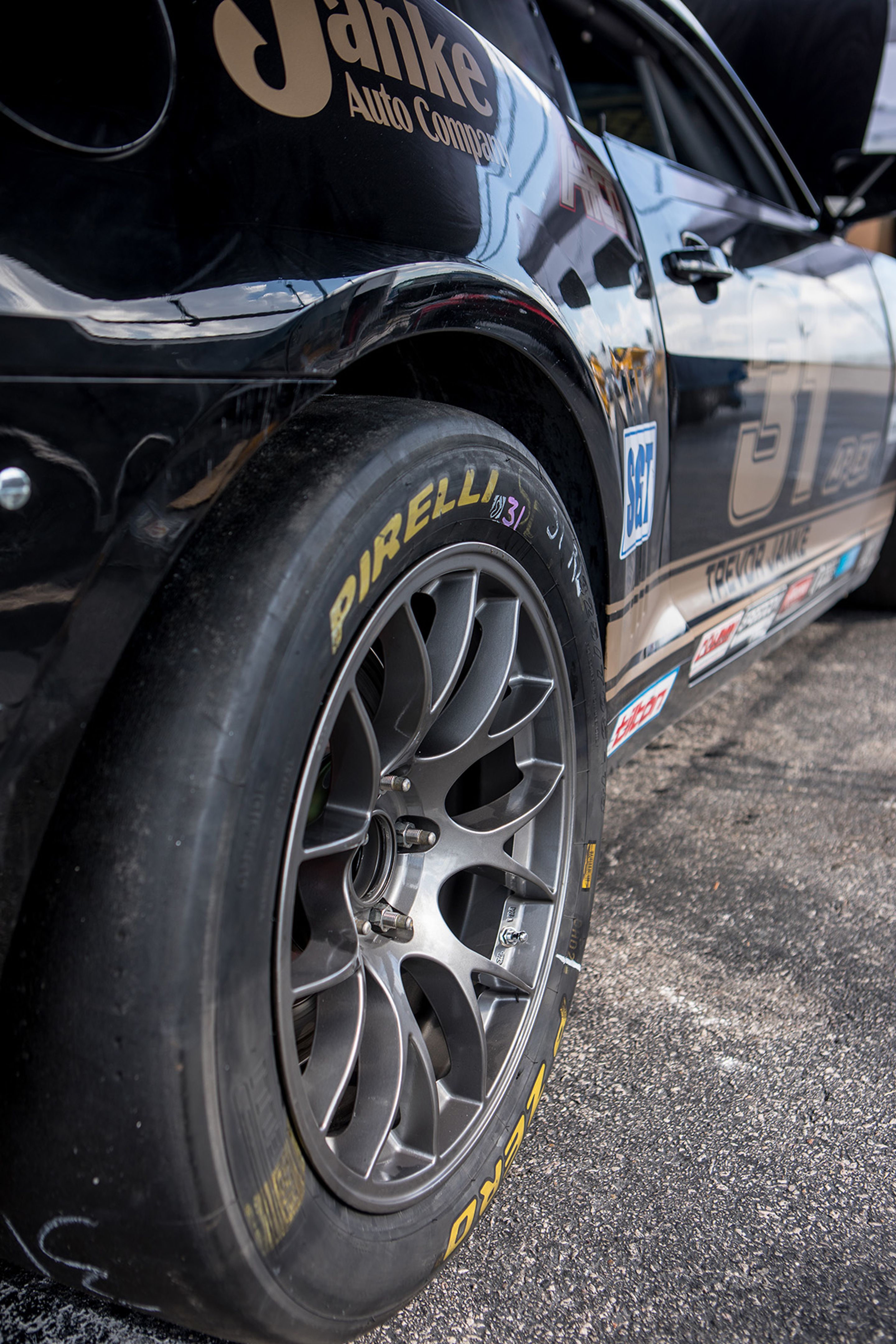 Black Chevrolet 5th Gen Camaro SS with 18" EC-7 Apex wheels in Anthracite