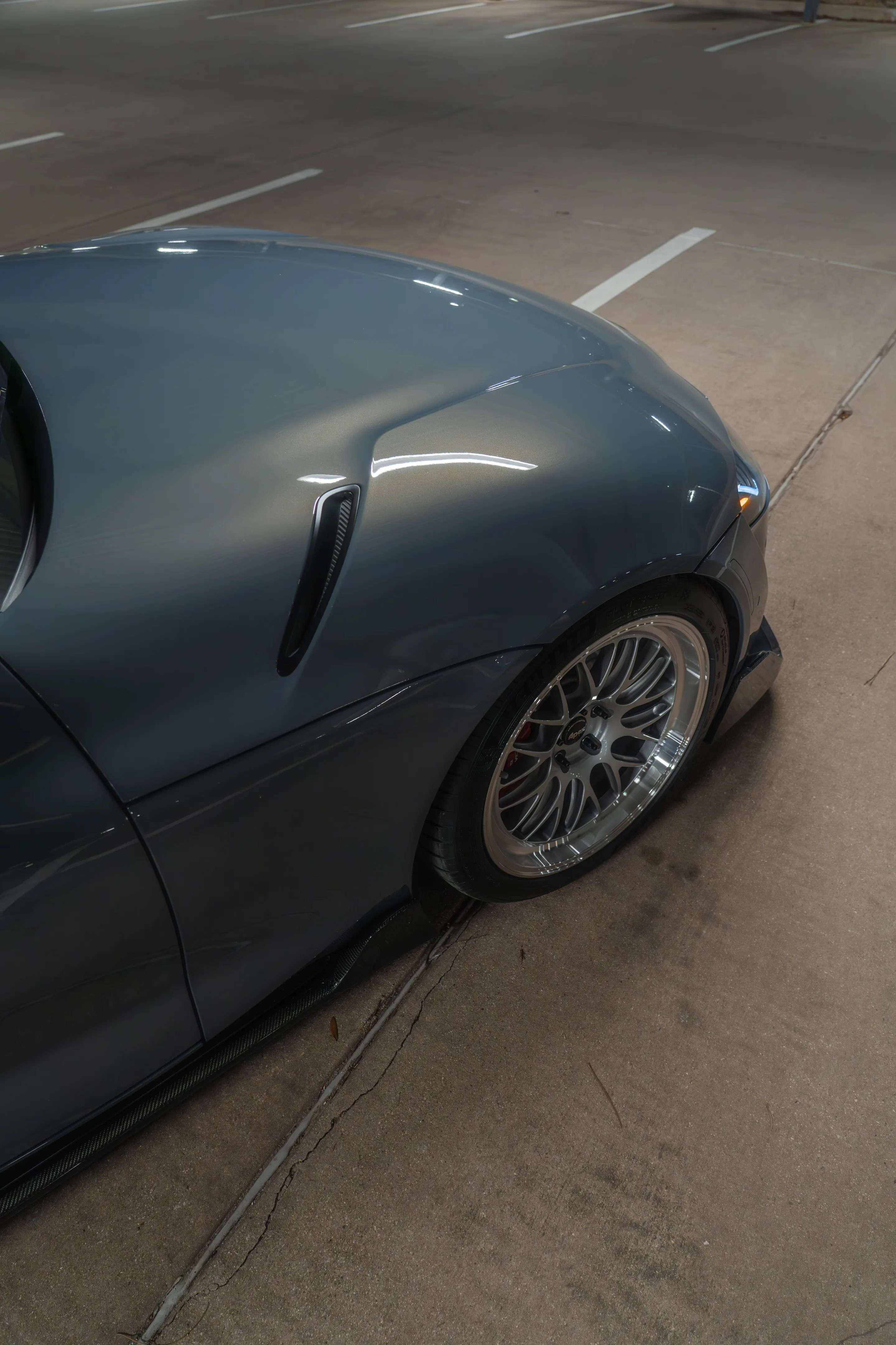 Grey Toyota GR Supra with 19" ML-10RT Apex wheels in Machined Lip Race Silver