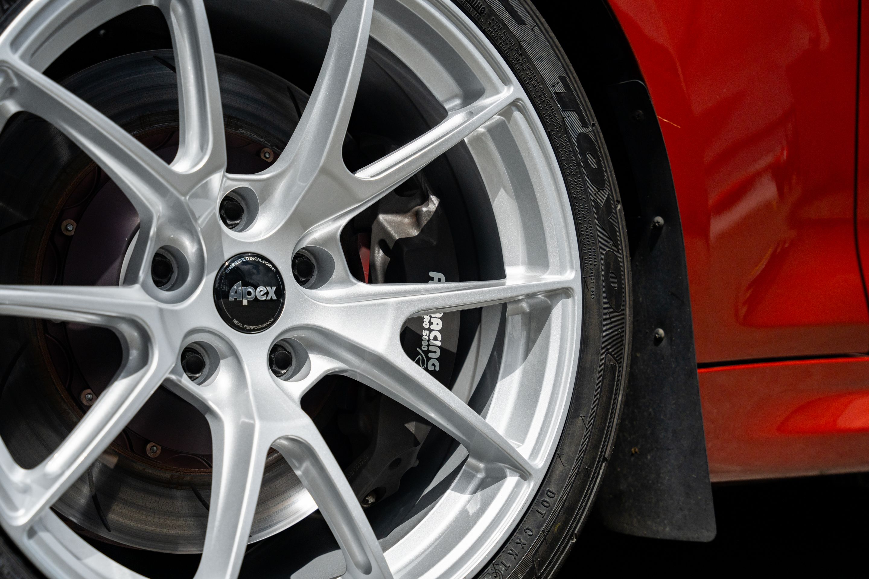 Orange BMW F87 M2 with 18" VS-5 Apex wheels in Race Silver