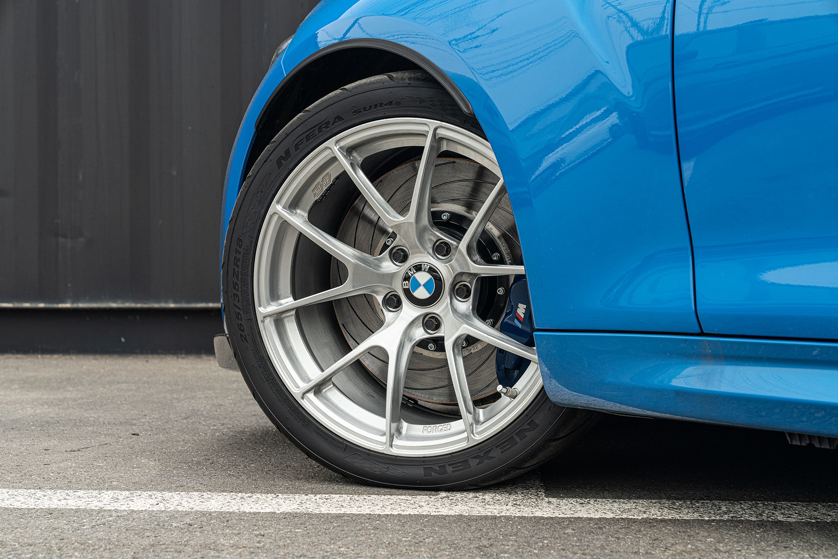 Blue BMW F87 M2 with 18" VS-5RS Apex wheels in Brushed Clear