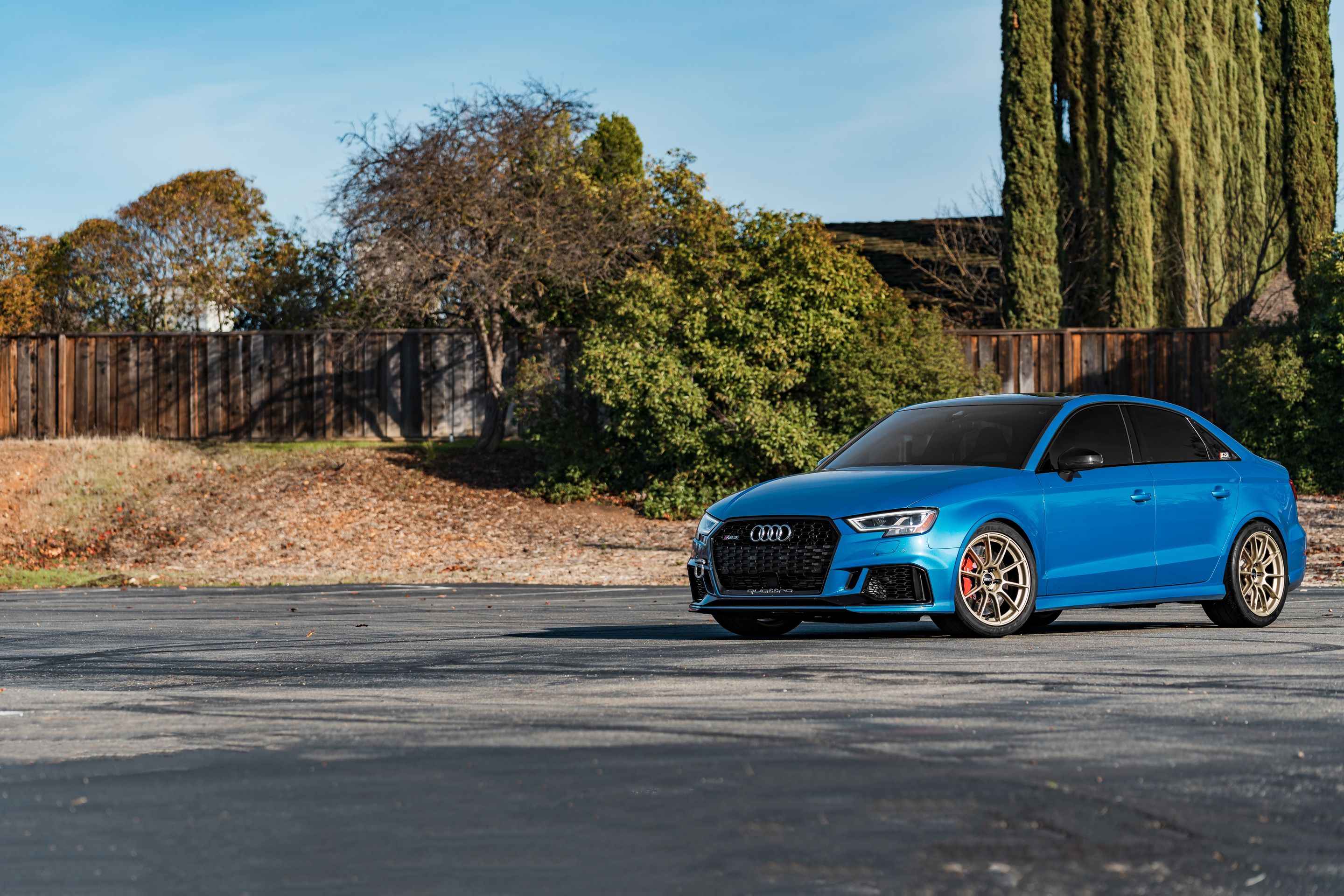 Blue Audi 8V RS 3 with 18" SM-10RS Apex wheels in Motorsport Gold