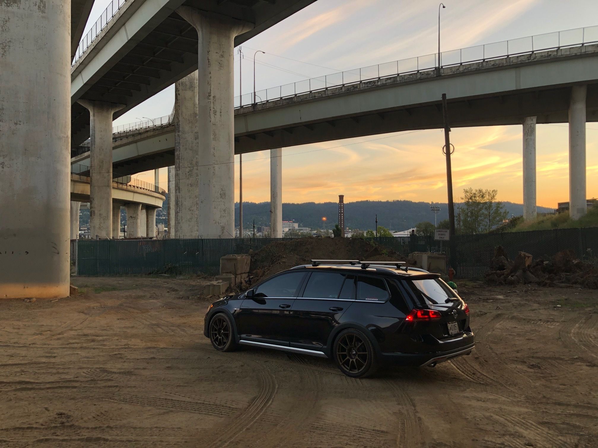 Black VW MK7 Alltrack/SportWagen Alltrack with 18" SM-10 Apex wheels in Satin Bronze