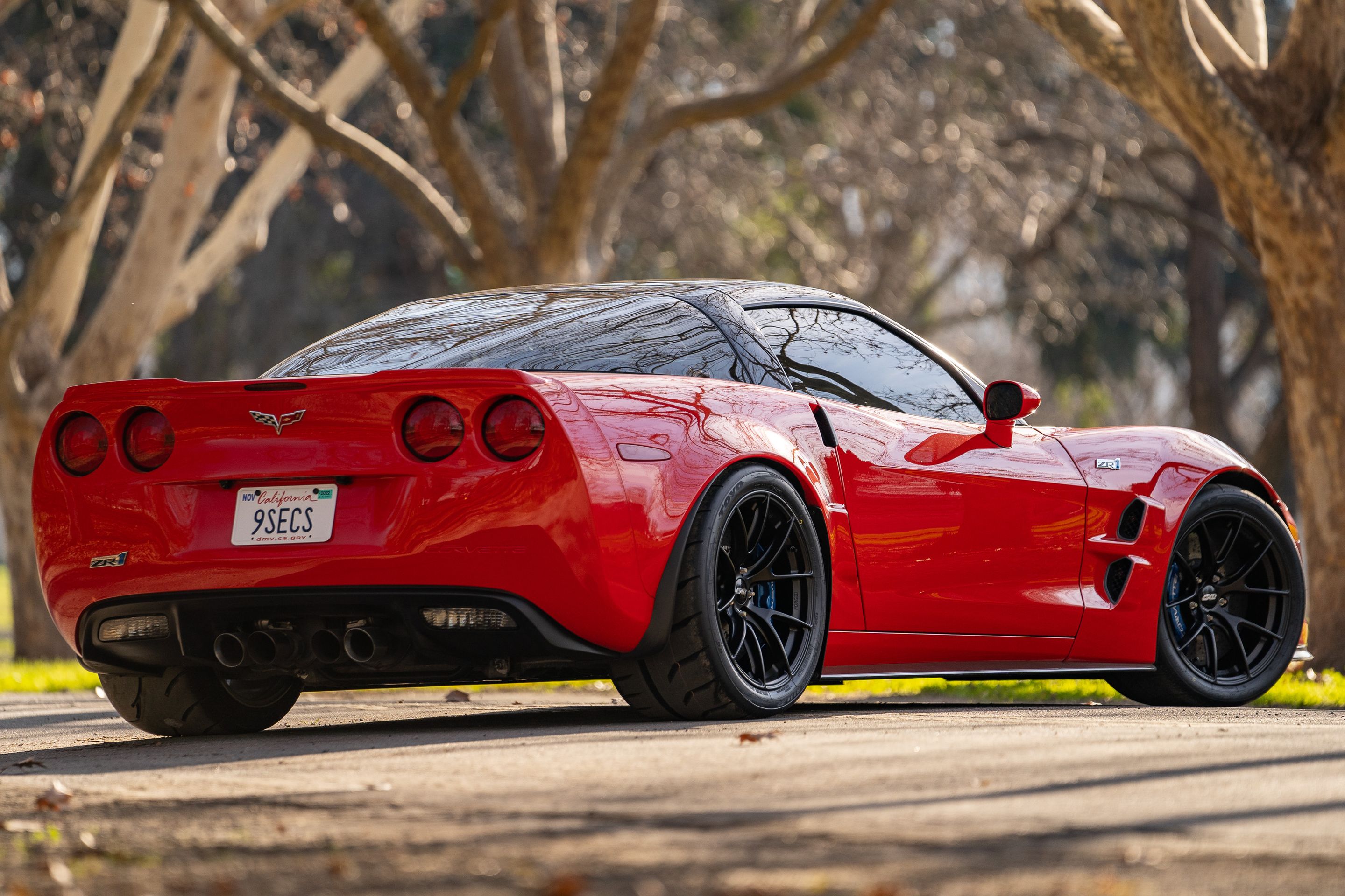 Red Chevrolet C6 Corvette ZR-1 with 19" VS-5RS Apex wheels in Satin Black