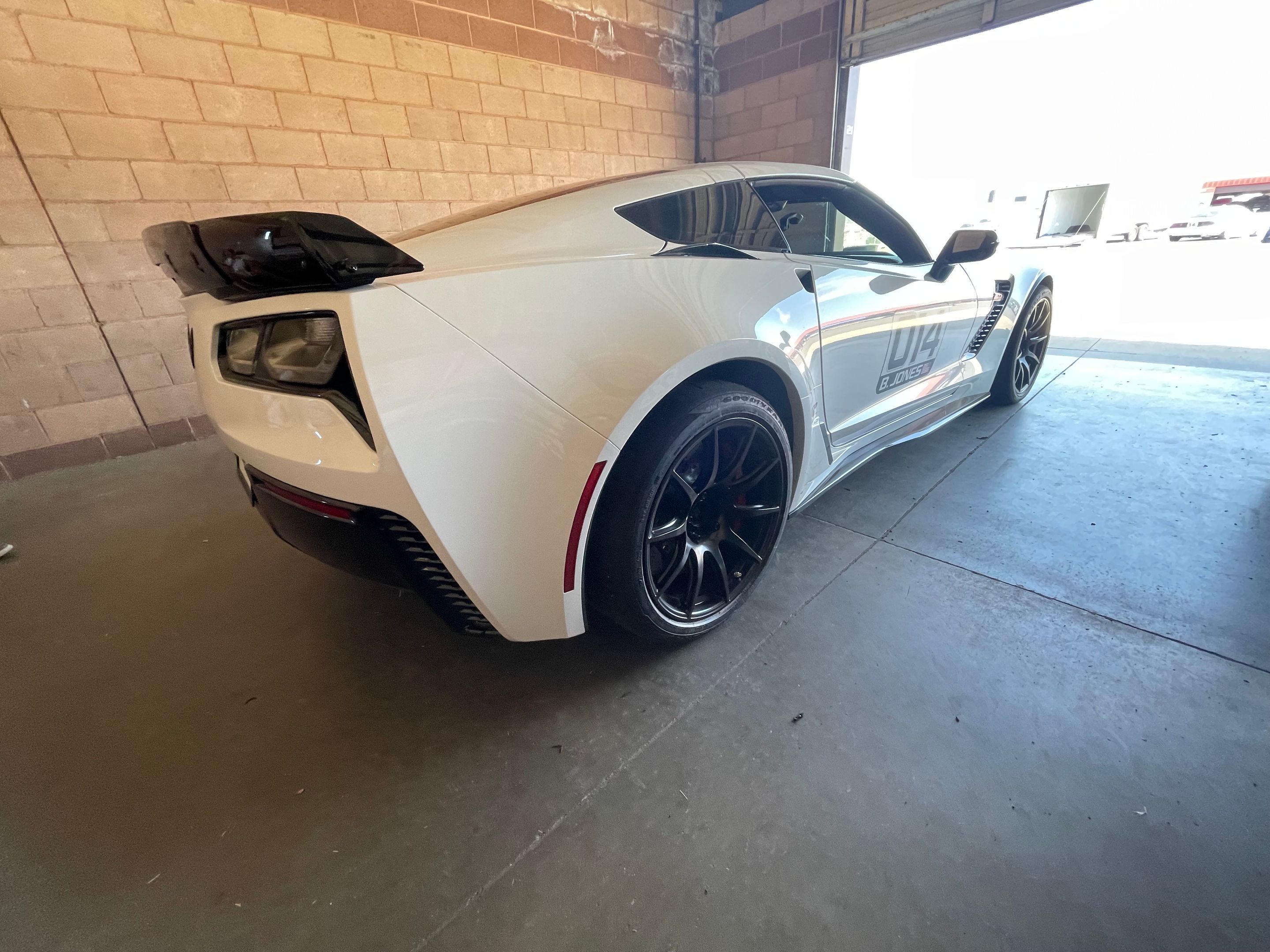 White Chevrolet C7 Corvette Z06 with 19" SM-10 Apex wheels in Satin Black