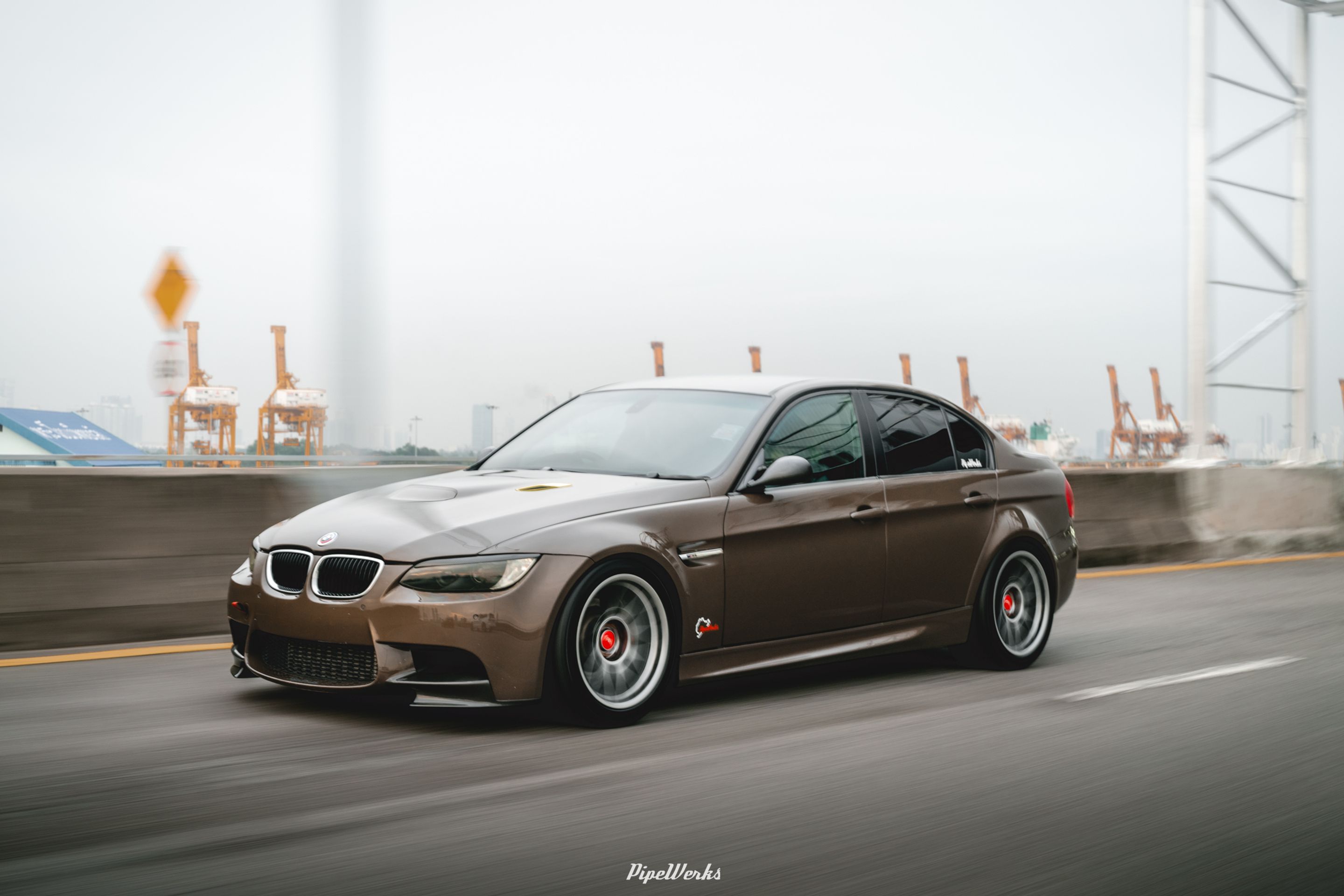 Brown BMW E90 Sedan 3 Series with 18" ARC-8 Apex wheels in Hyper Black