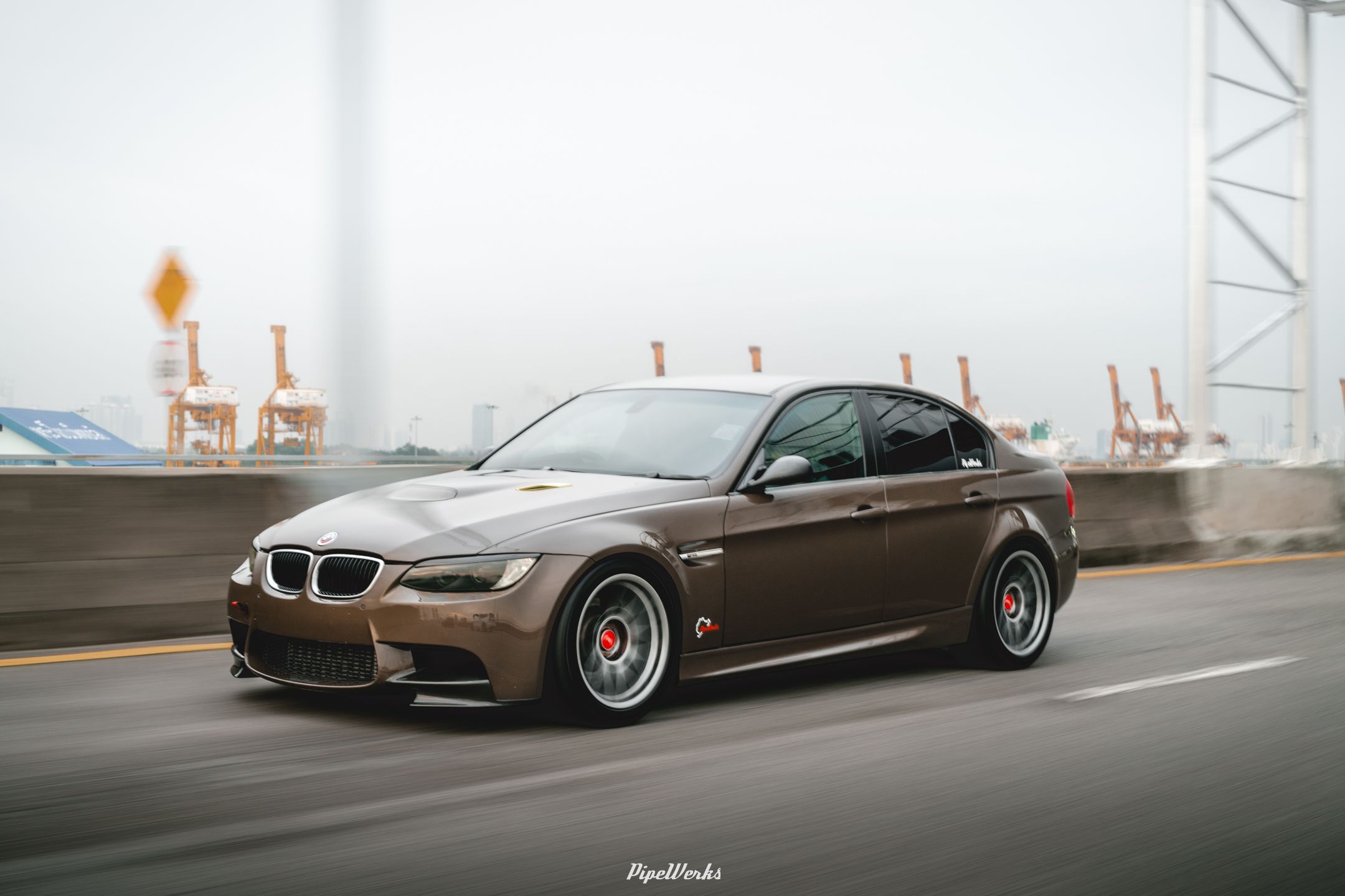 Brown BMW E90 Sedan 3 Series with 18" ARC-8 Apex wheels in Hyper Black