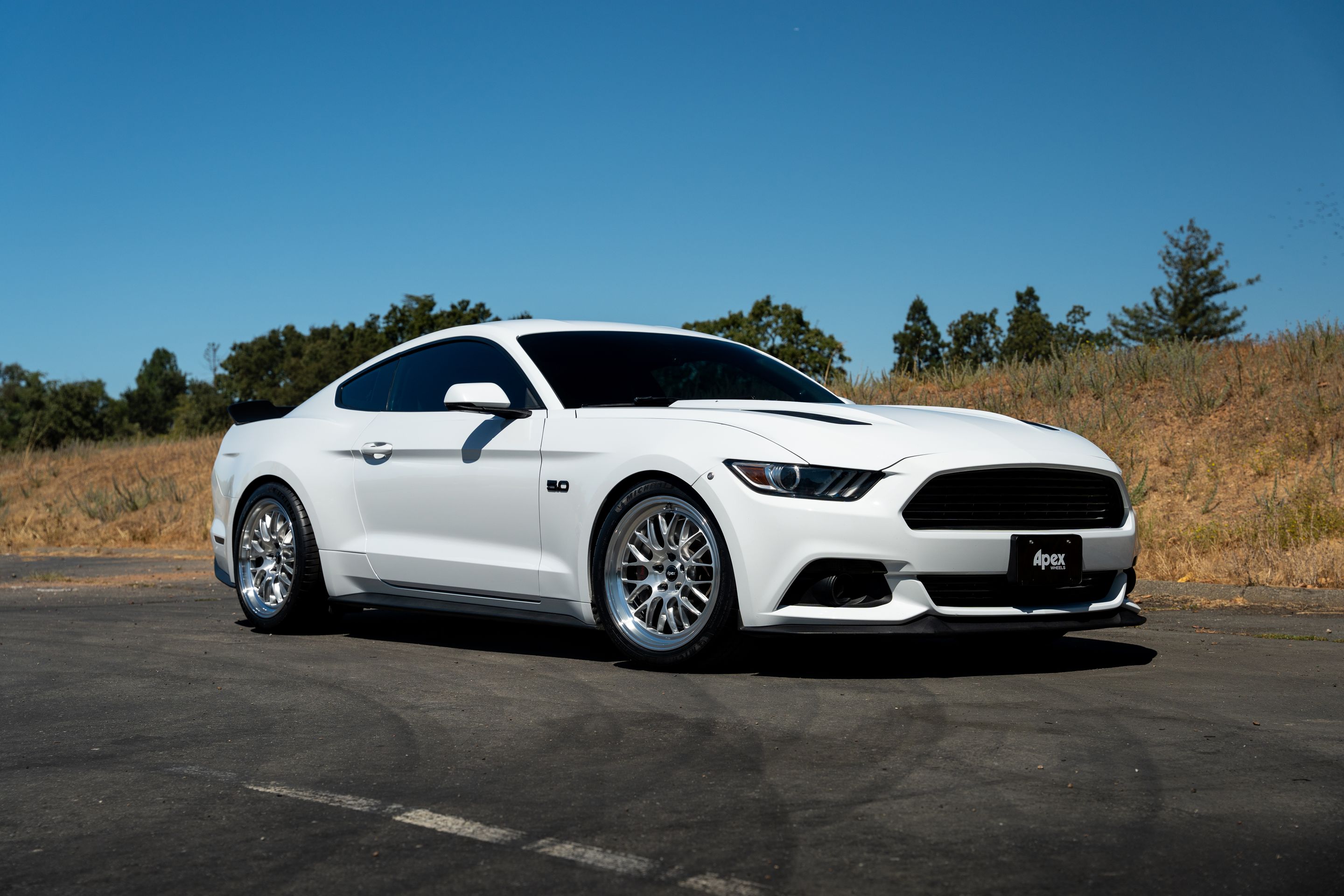White Ford S550 Mustang GT with 19" ML-10RT Apex wheels in Machined Lip Brushed Clear