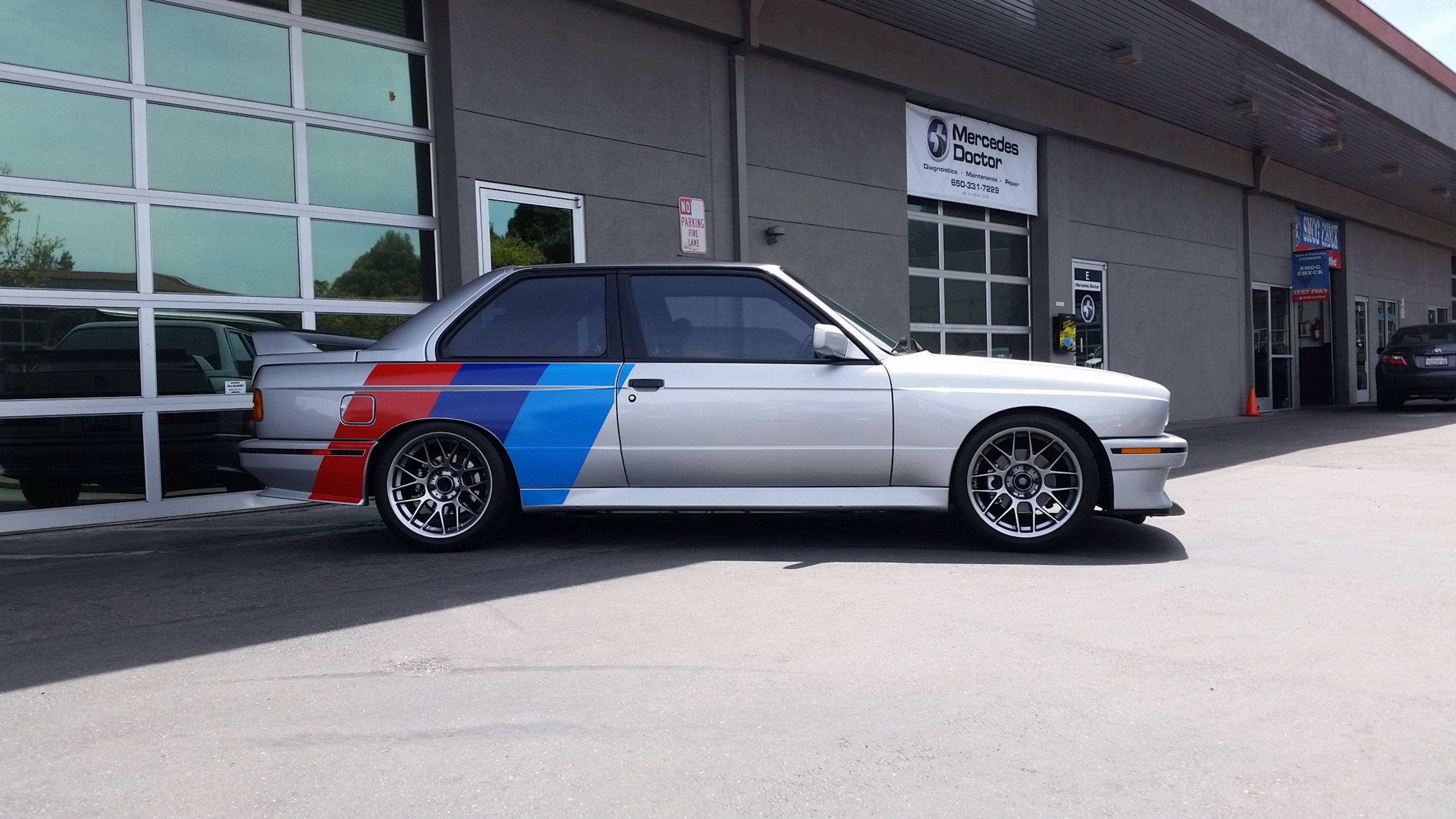 Silver BMW E30 M3 with 17" ARC-8 Apex wheels in Hyper Black