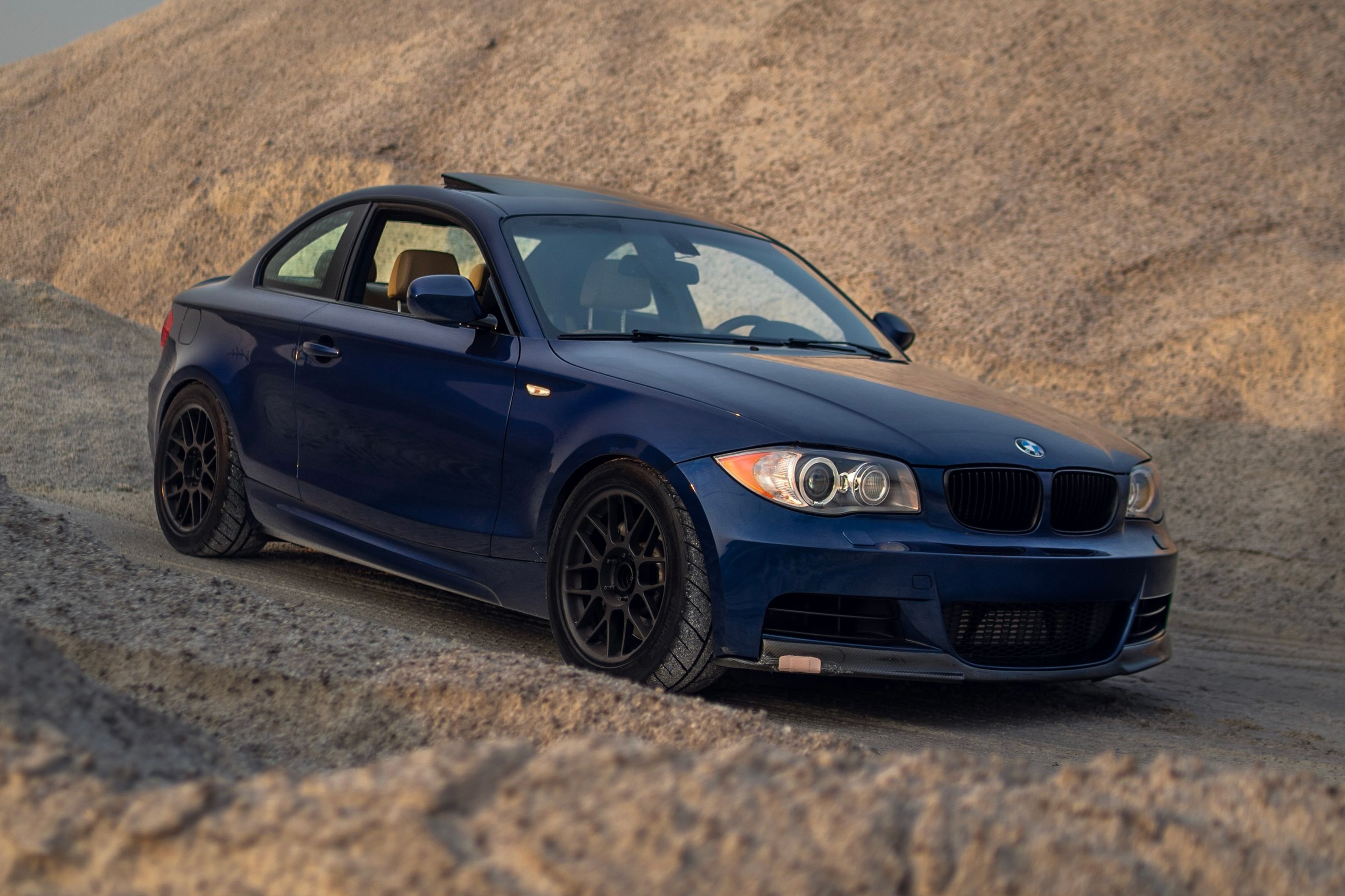 Blue BMW E82 Coupe 1 Series with 17" ARC-8 Apex wheels in Satin Black