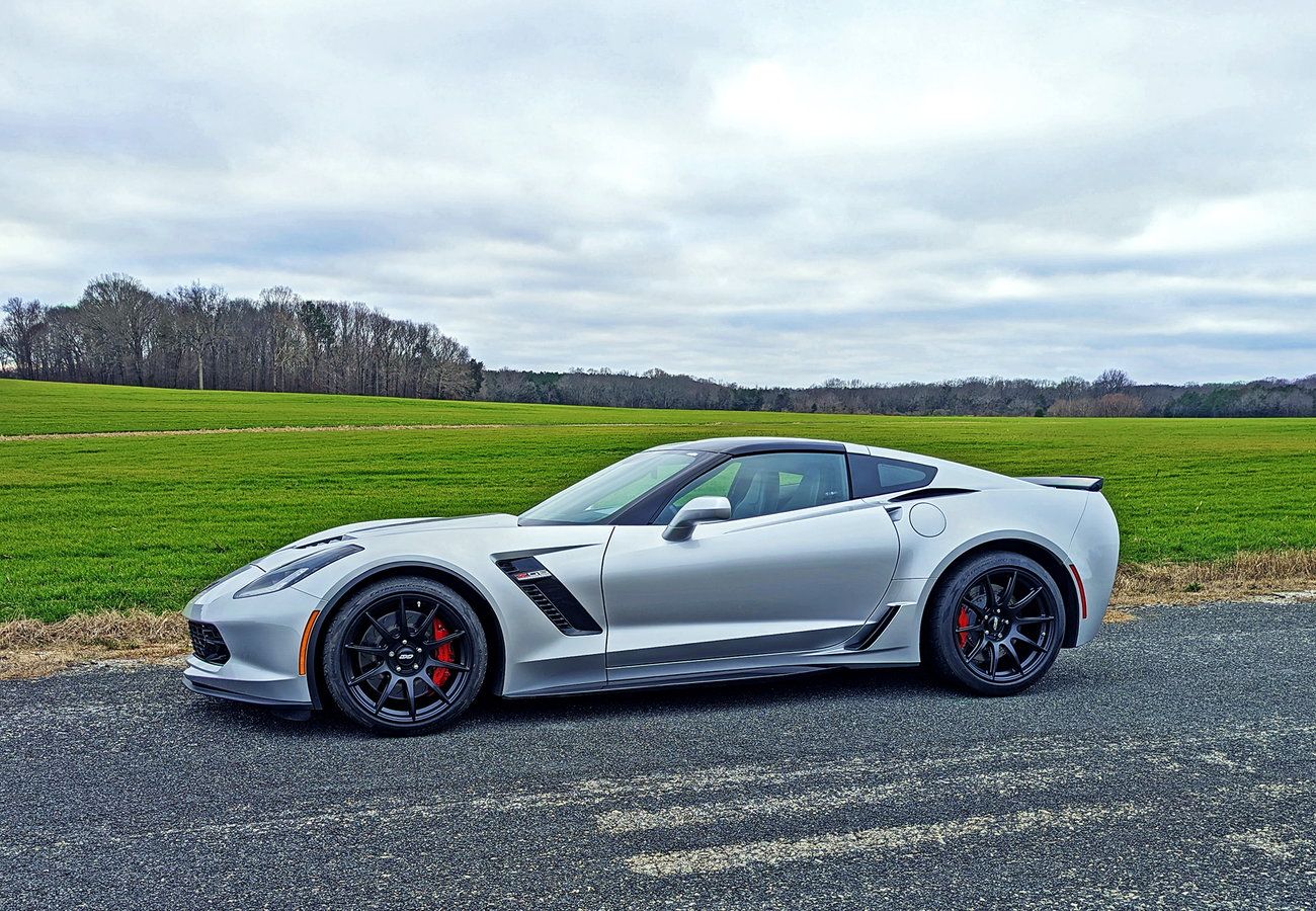 Silver Chevrolet C7 Corvette Z06 with 19" SM-10 Apex wheels in Satin Black