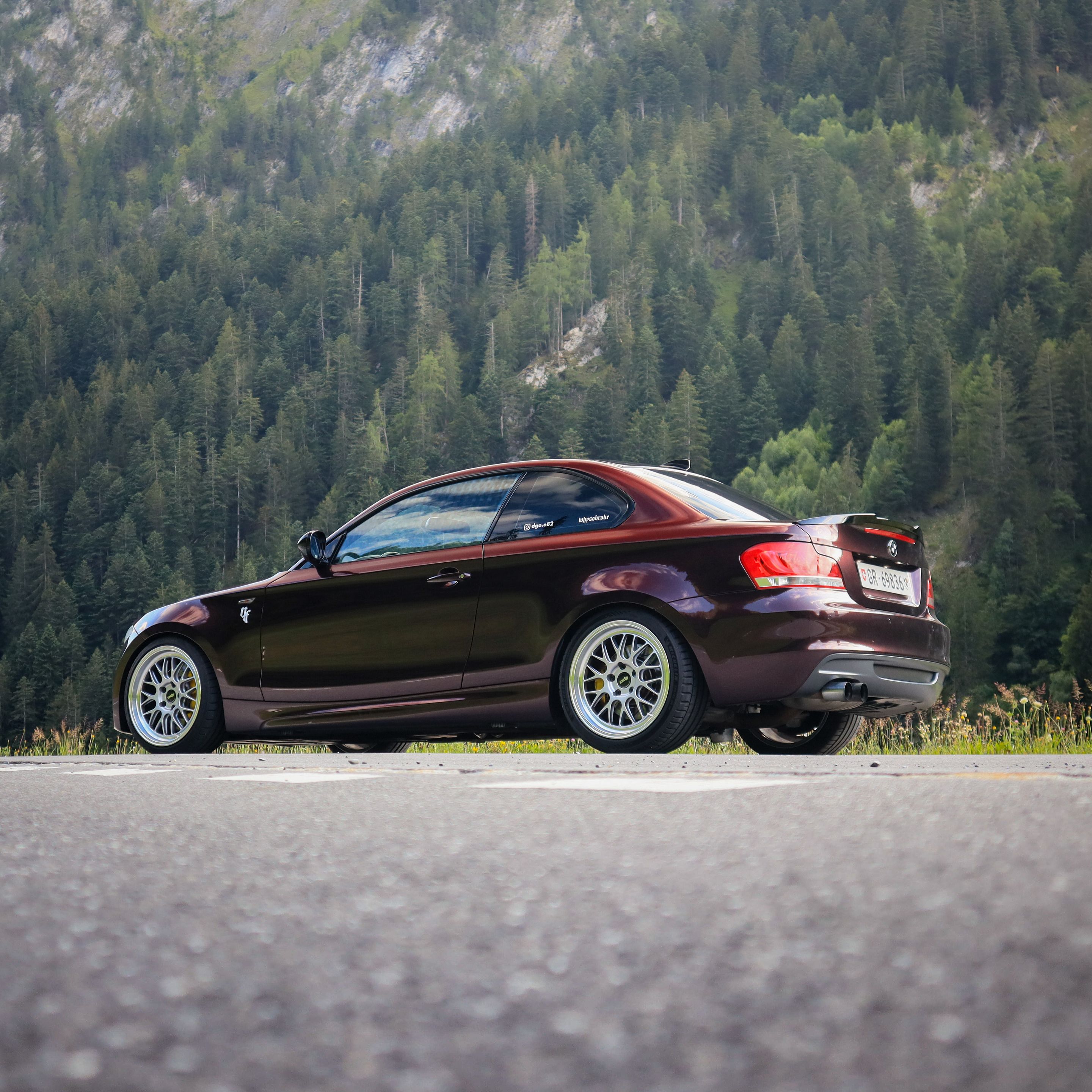 Red BMW E82 Coupe 1 Series with 18" ML-10RT Apex wheels in Machined Lip Race Silver