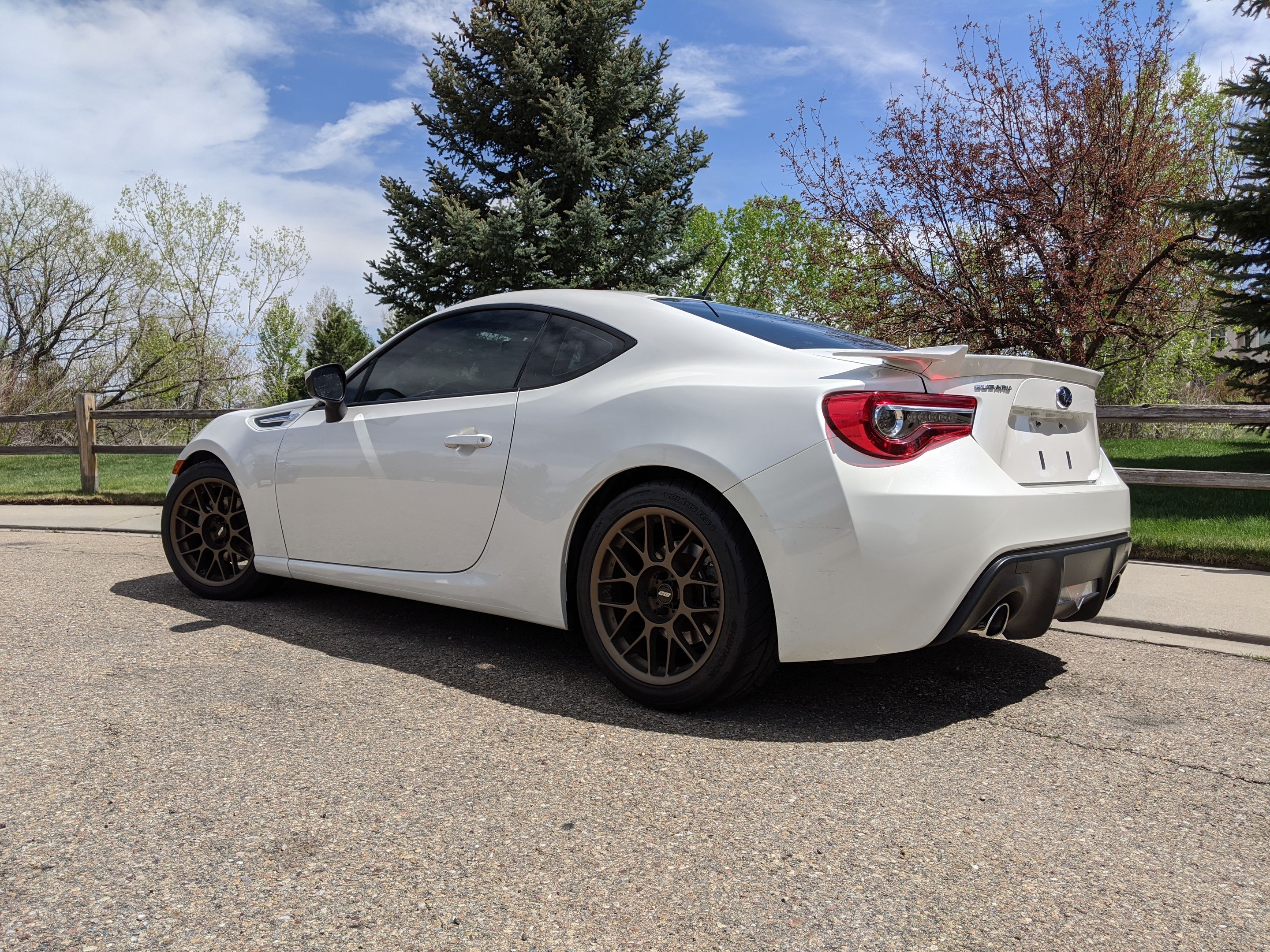 White Subaru ZC6 / Gen 1 BRZ with 17" ARC-8 Apex wheels in Satin Bronze